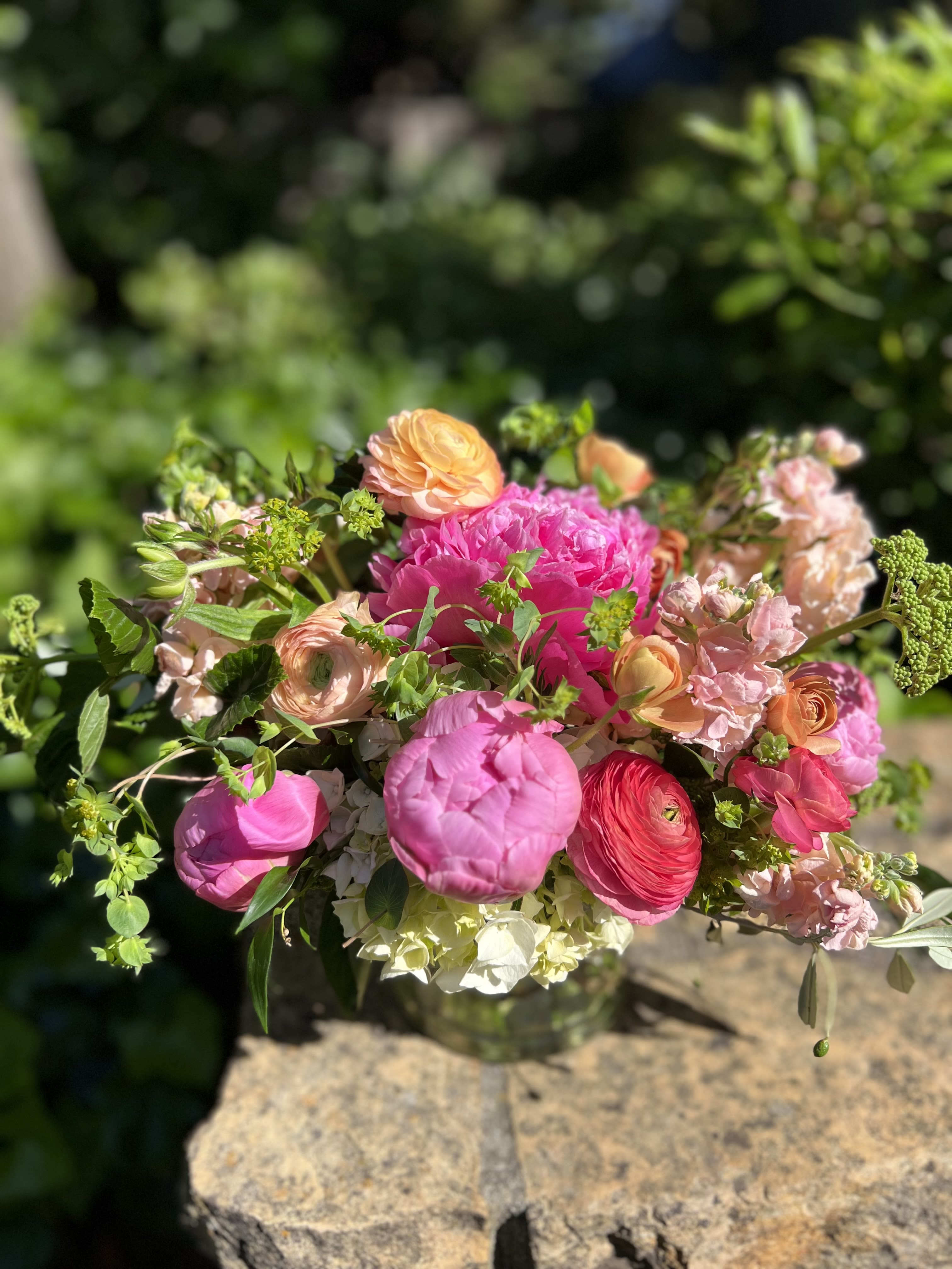 Peonies Please!  - A garden mix to include these seasonal and luxurious beauties who are in town for just a couple more weeks! Design will include a minimum of 6 stems in available shades of pink and coral for the standard price.  