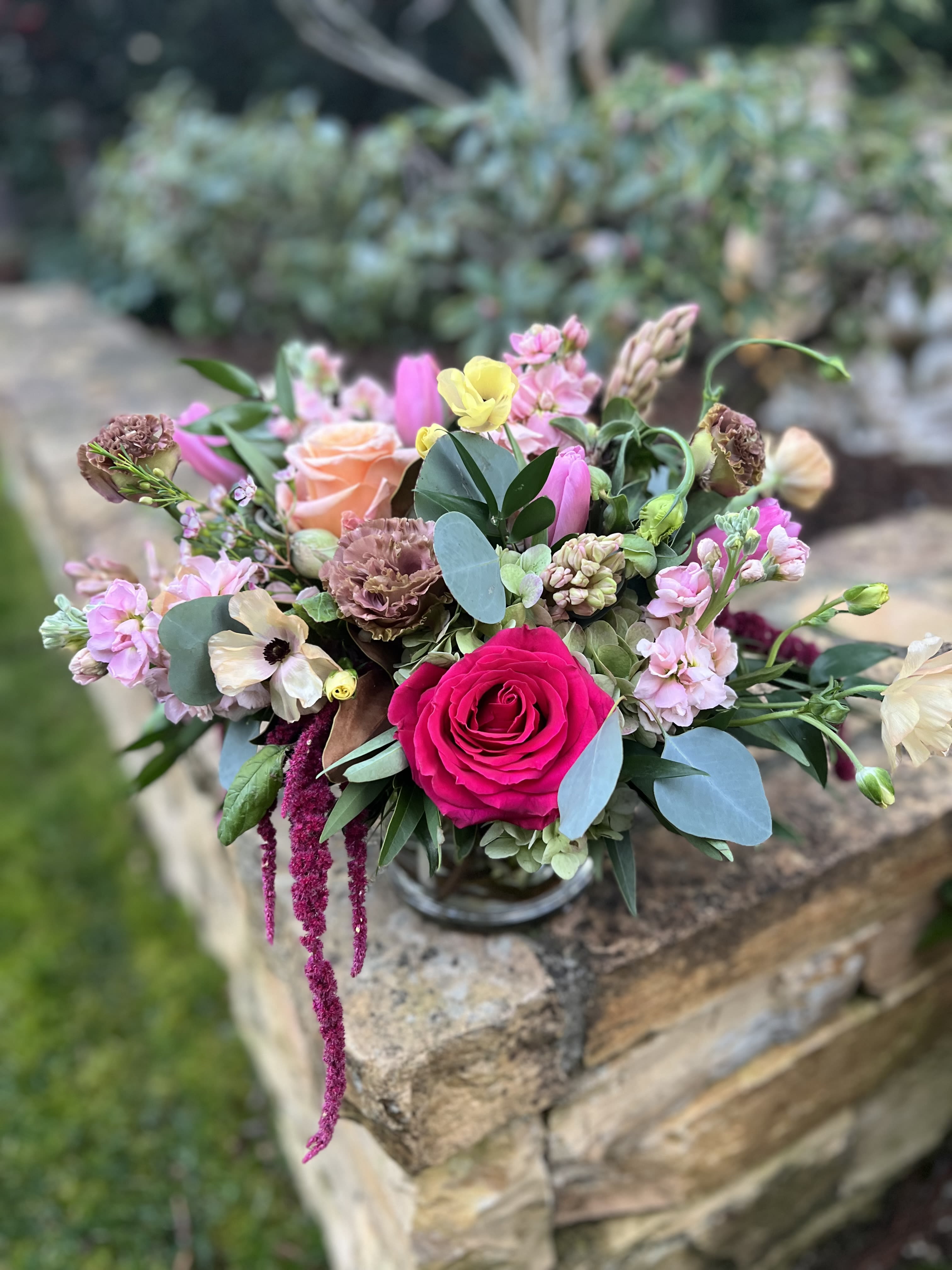 Starburst  - Shades of pinks and peach roses and tulips with green hydrangea, dusty mauve lisianthus, and fragrant hyacinth is perfect for a Spring time lover. 