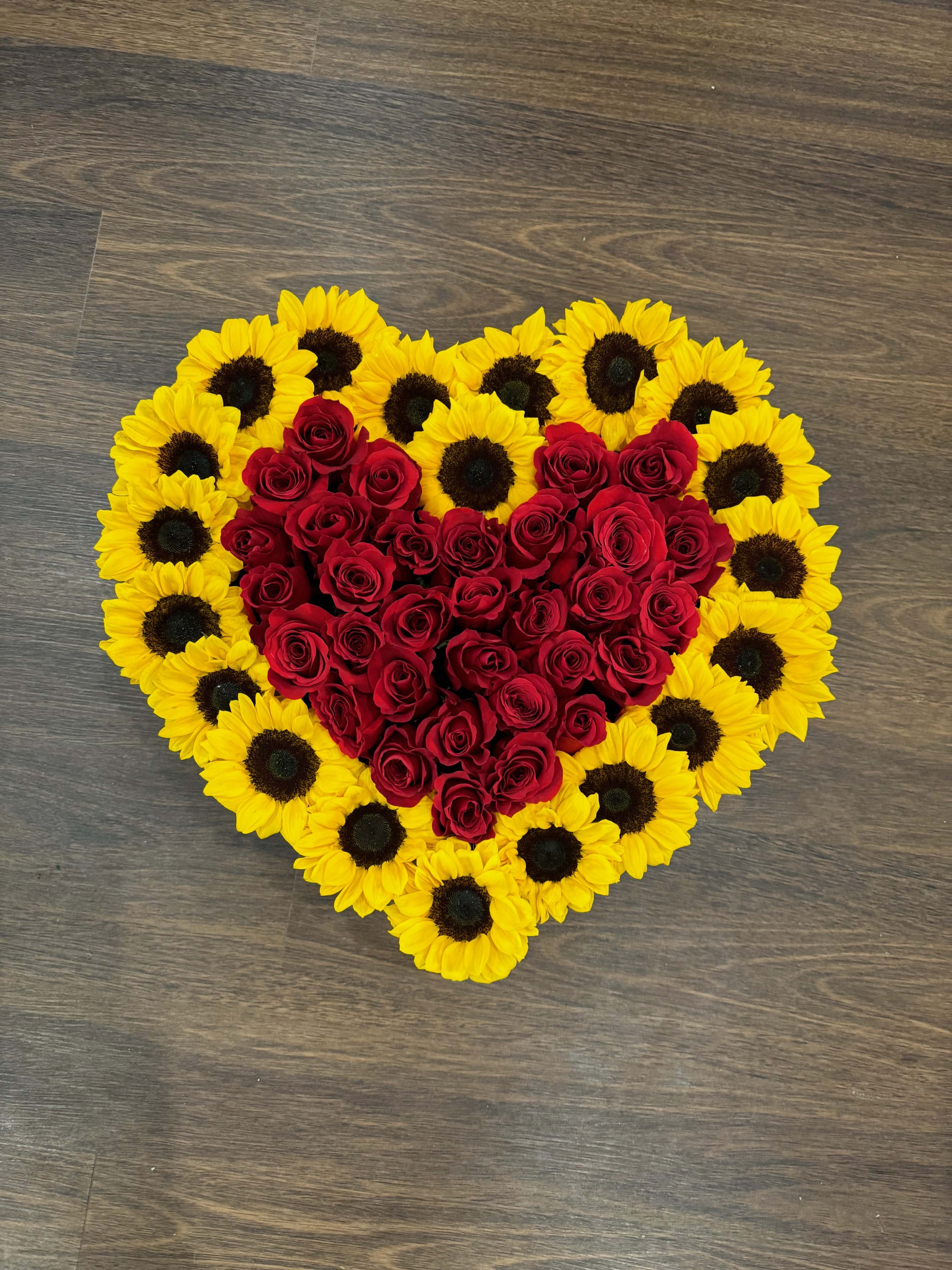 Love you my sunshine - Sunflowers and red roses in a large heart box.