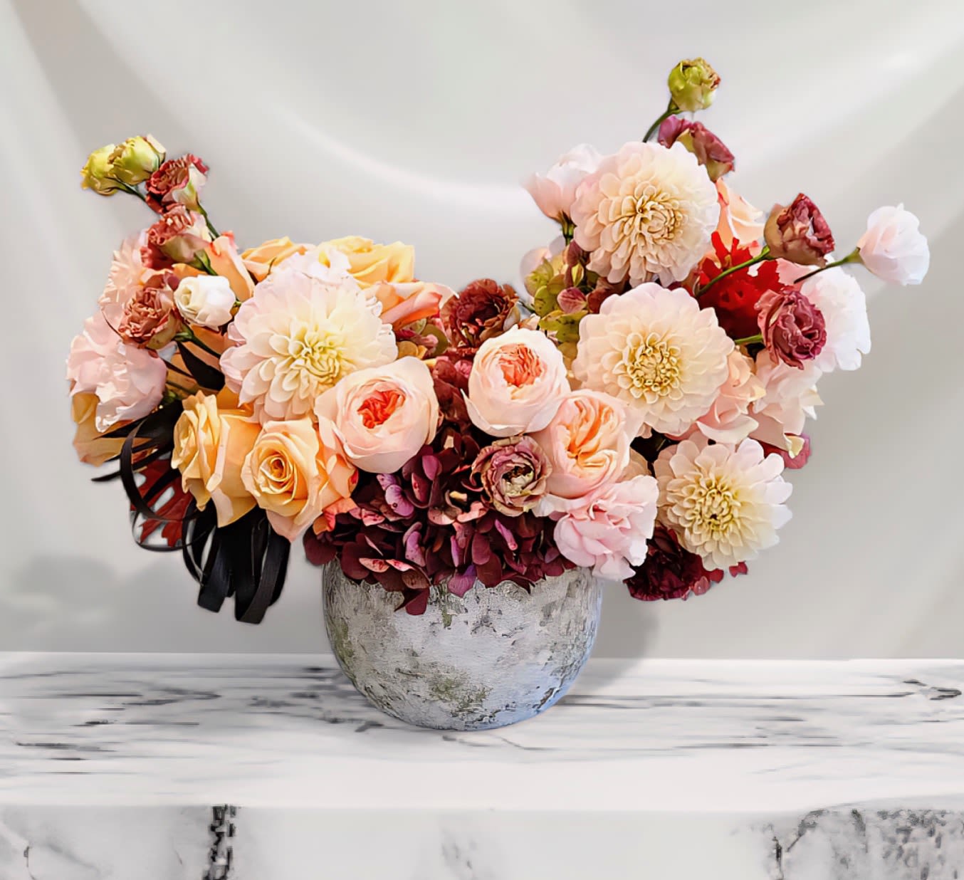 Tuscany  - Premium Garden Rose, Hydrangea, Dahlias, Lisianthus, in rustic ceramic vase.