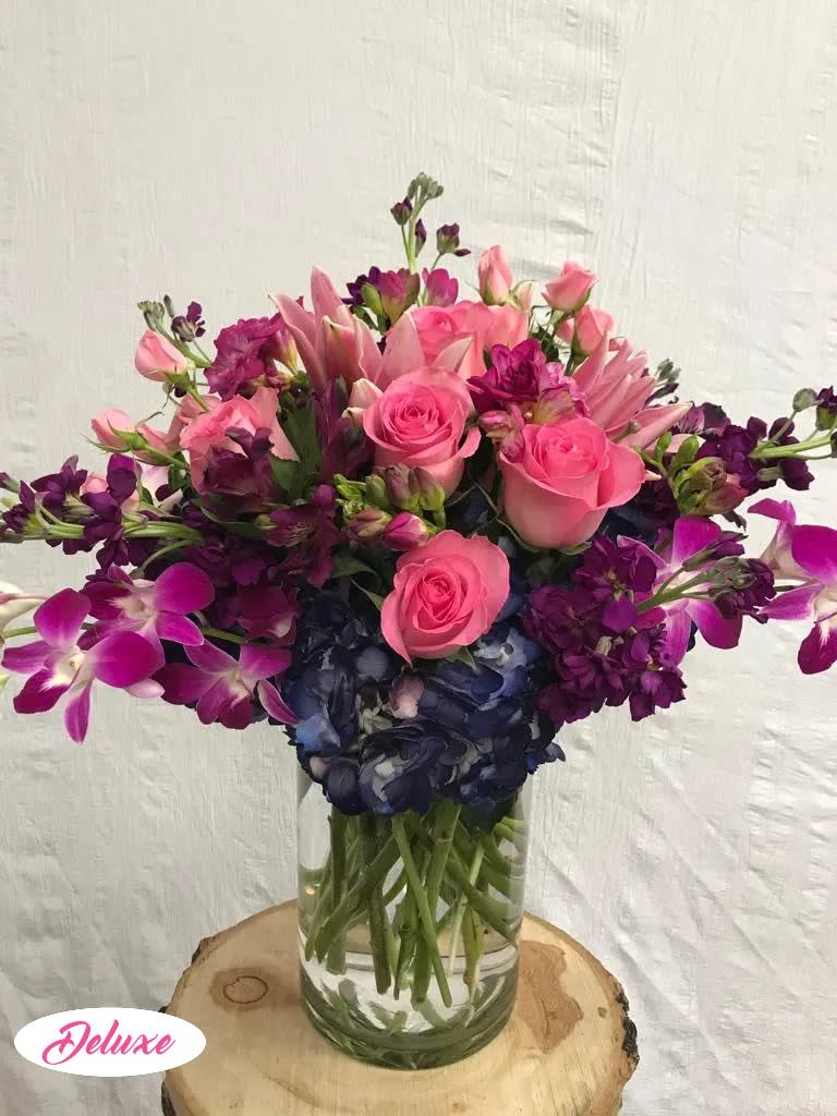 Stunning Beauty - This vase of flowers is absolutely beautiful! A lovely selection of all high-end flowers includes roses, hydrangea, orchids, lilies and more.  