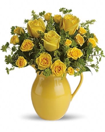 Sunny Day Pitcher of Roses - Want to make any day sunny for someone special? Simply have this cheerful pitcher of bright yellow roses hand-delivered to them and they will bask in its warm glow. Just think: No SPF needed! Brilliant yellow roses and spray roses are arranged in a delightful mix that's delivered in a keepsake yellow pitcher they can use again and again. What a heartwarming gift! 