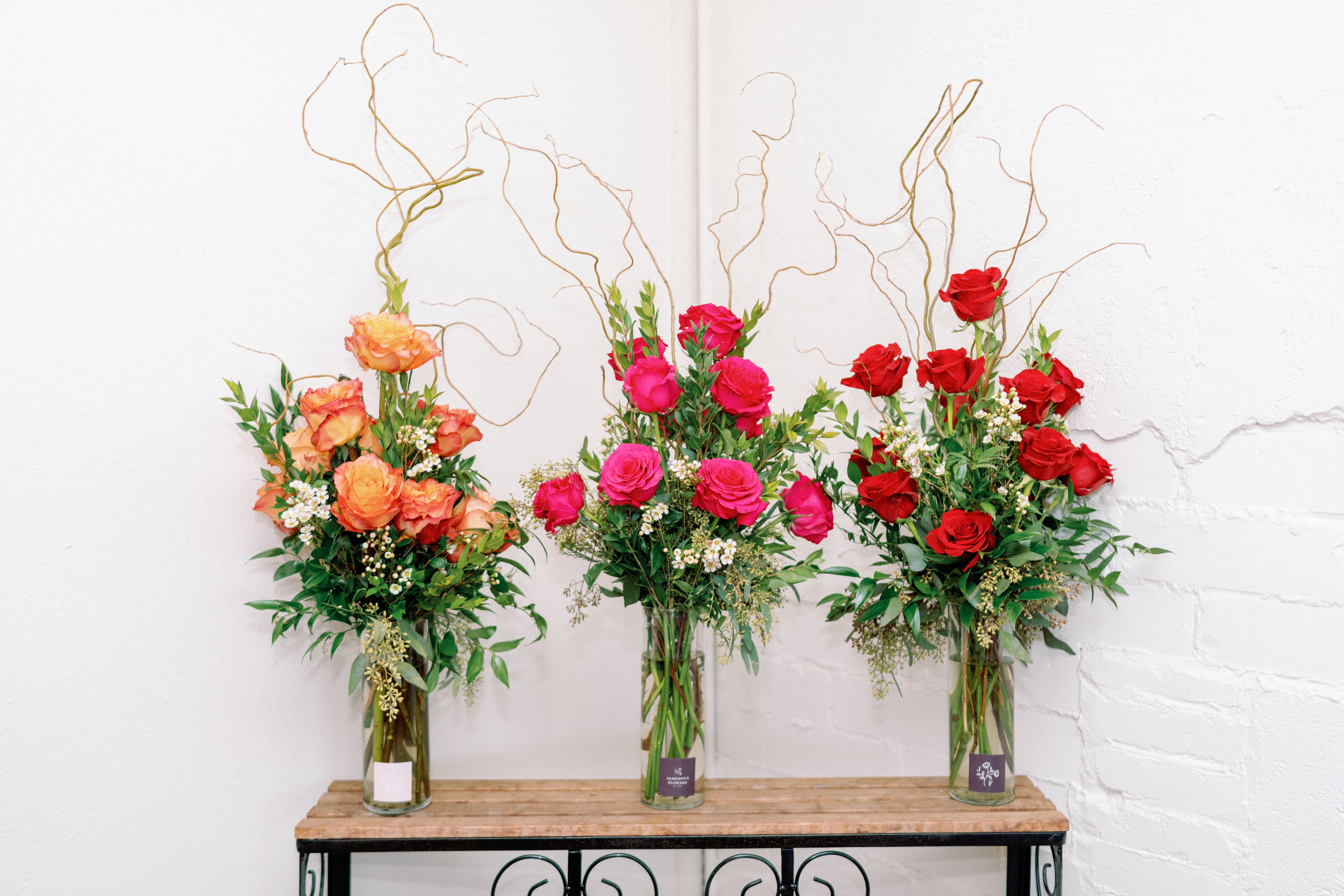 Dozen Rose Arrangement  - A Traditional Dozen Rose Arrangement! Please Note your color selection at checkout! Red (Freedom Rose), Orange/Pinkish (Free Spirit Rose), or Hot Pink (Hot Spot Rose).   Special requests, please call.