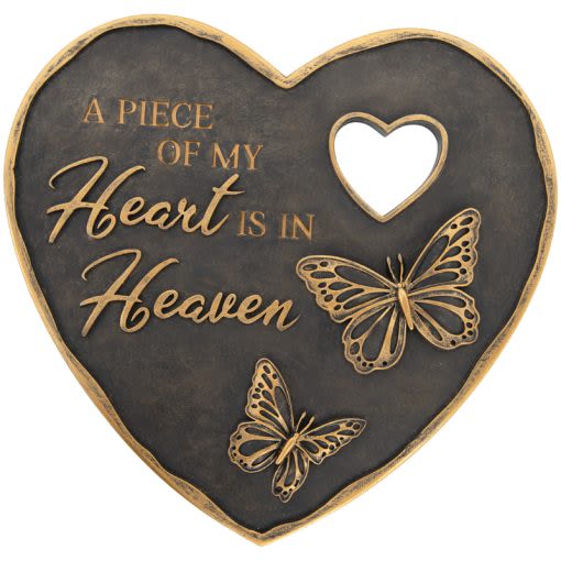 A Piece of My Heart Is In Heaven Garden Stone - Garden Stones are cast in resin and hand painted to emulate the look of real stone. A keyhole hanger is in back for easy hanging or can be placed on the ground.  W: 9 3/4″ H: 9 1/4″ Inscription reads, "A piece of my heart is in Heaven."