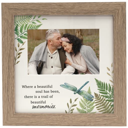  Where A Beautiful Soul Has Been There Is a Trail of Beautiful Memories Frame - Our Frames are designed, printed and packaged in the USA! Comprised of wood composite and glass with an easel backing. Cream mat holds a 4 x 6 photo. W: 9.5" H: 9.5" D: 0.75" Sentiment reads, "Where a beautiful soul has been, there is a trail of beautiful memories."