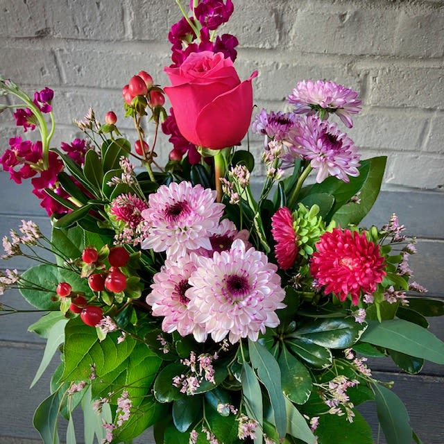 Raspberry Radiance - This sweet and juicy arrangement is perfect for any home or office space. featuring a rose, chrysanthemums, and asters, the Raspberry Radiance is the perfect bouquet to welcome the spring season!