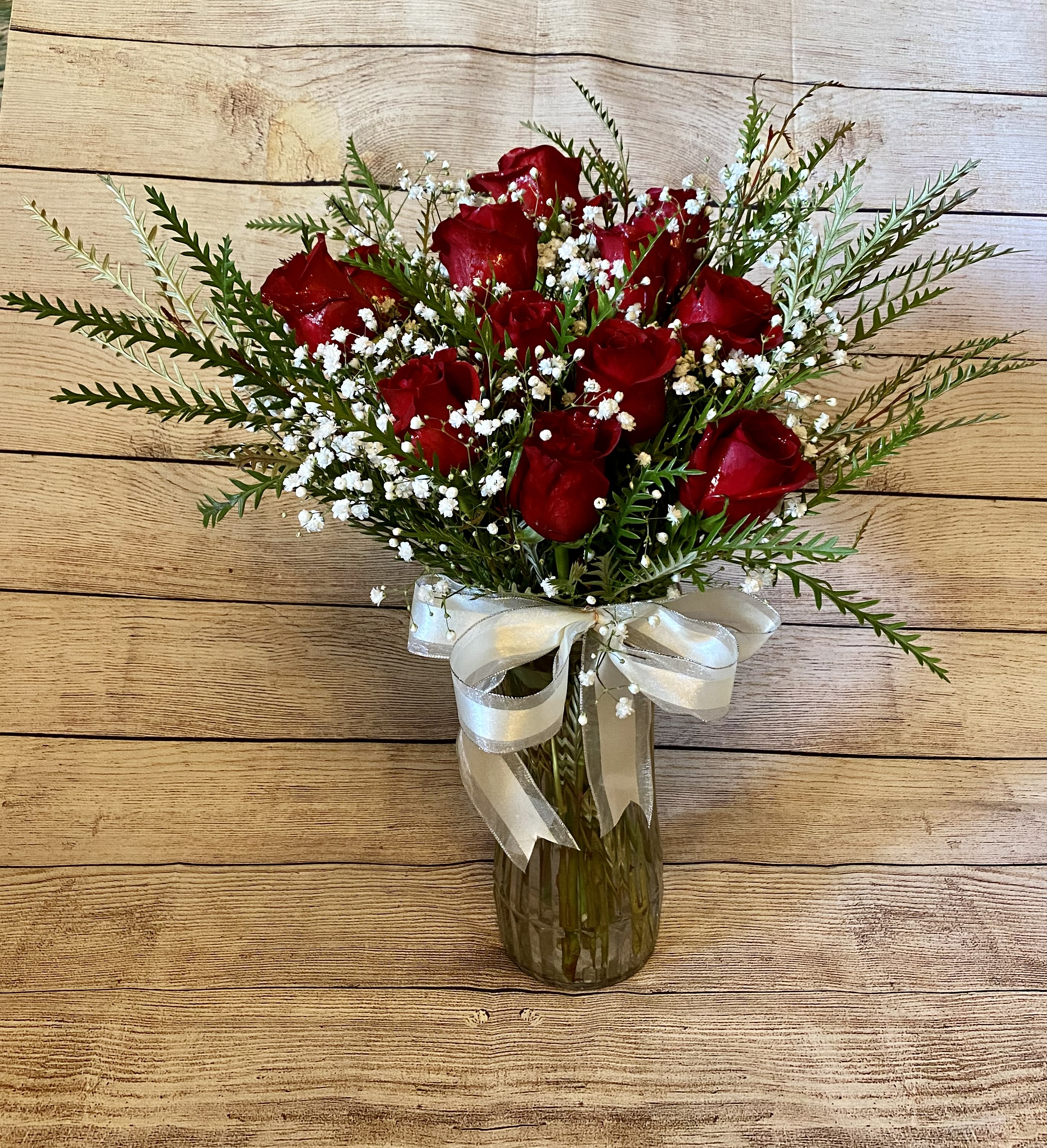 1 dozen, 2 dozen, 3 dozen RED roses - 1 dozen RED roses (standard) 2 dozen RED roses (deluxe) 3 dozen RED roses (premium)   Each RED rose dozen, may vary in a different shade of red, and will still be a beautiful shade of red for Valentine's Day gift giving and other times of the year too. As it gets closer to Valentine's, we may need to use a mix of Valentine colors (red, hot pink, pink, and white roses).