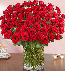 100 red roses (OR ANY COLOR) - 100 long stemmed roses in a clear vessel with crystal gems for the special person in your life