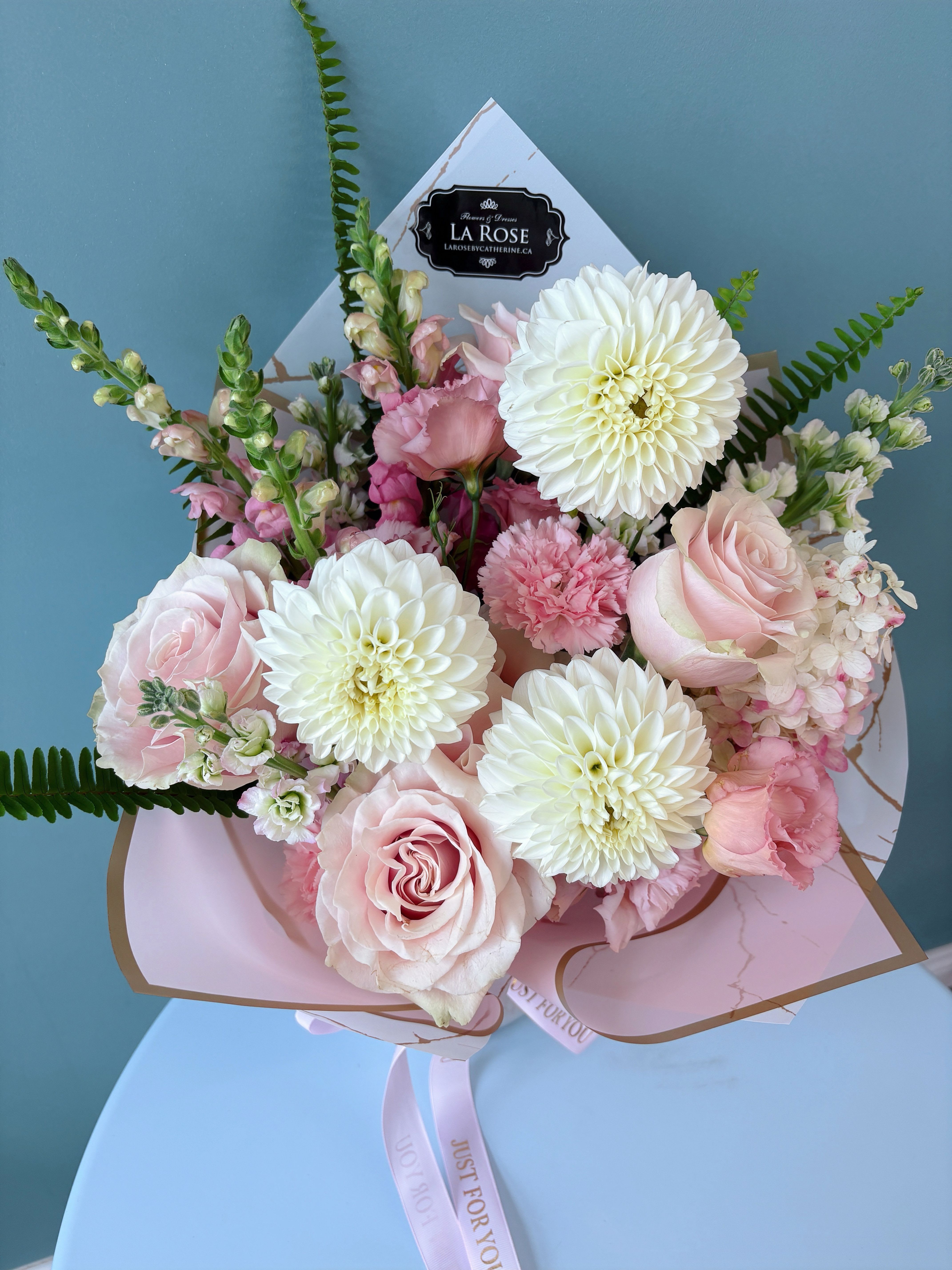 Blush Vase Bouquet - Featuring premium seasonal fresh blooms and foliage, arranged in a modern and artistic design, at the choice of your colour preference, all wrapped with designer's paper and packaging  standard size:  12-15 florals deluxe size:  20-22 florals premium size:  26-28 florals  Leave us a note at the check out for your preferred colour theme and floral variety. It is NOT guaranteed that your final order will match what you requested but we will do our best to design accordingly.