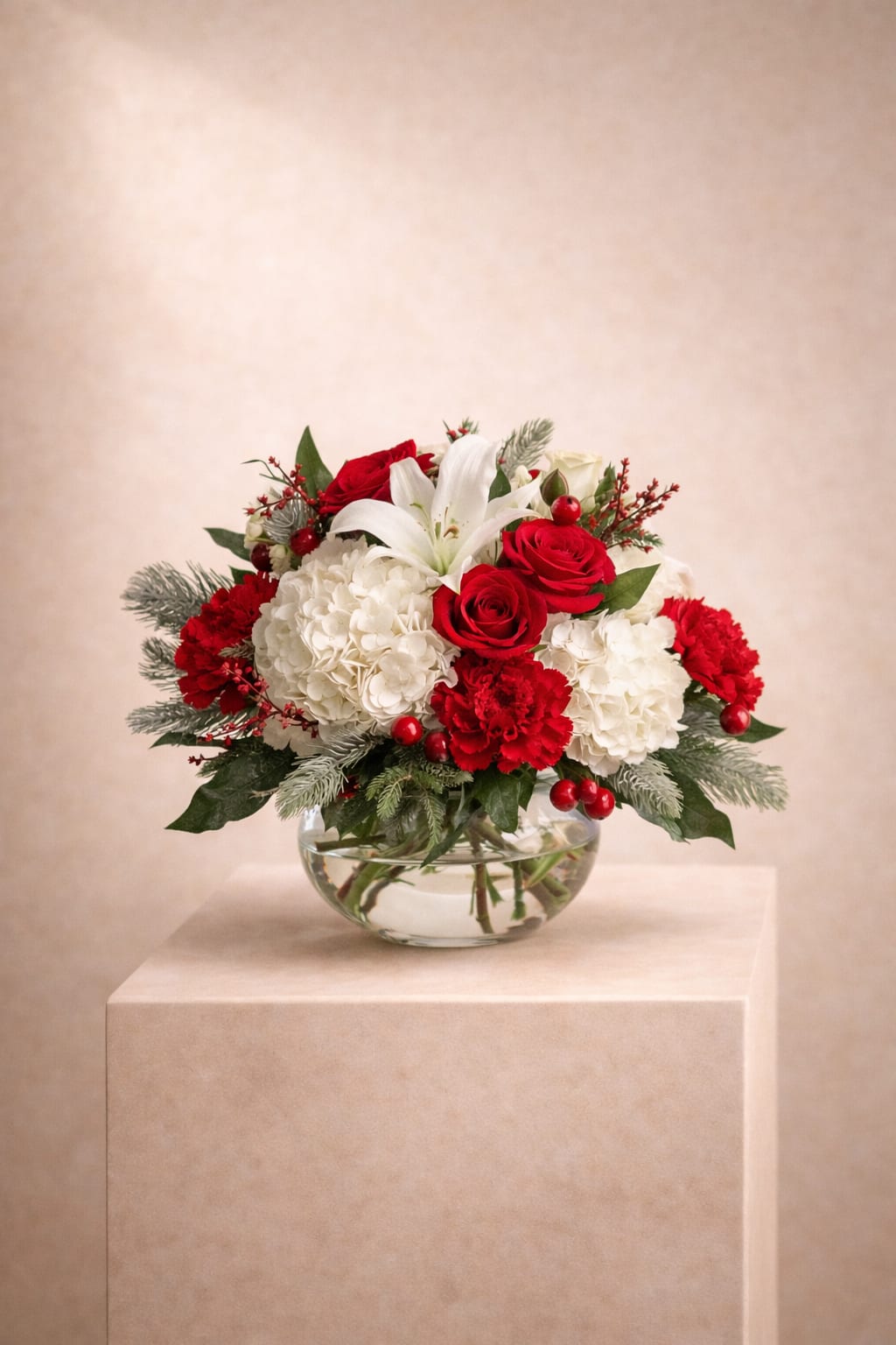 Velvet Romance  - Velvet Romance features velvety red roses, lush white hydrangeas, and elegant lilies arranged in a modern glass bowl. A romantic and timeless design perfect for anniversaries and special occasions.