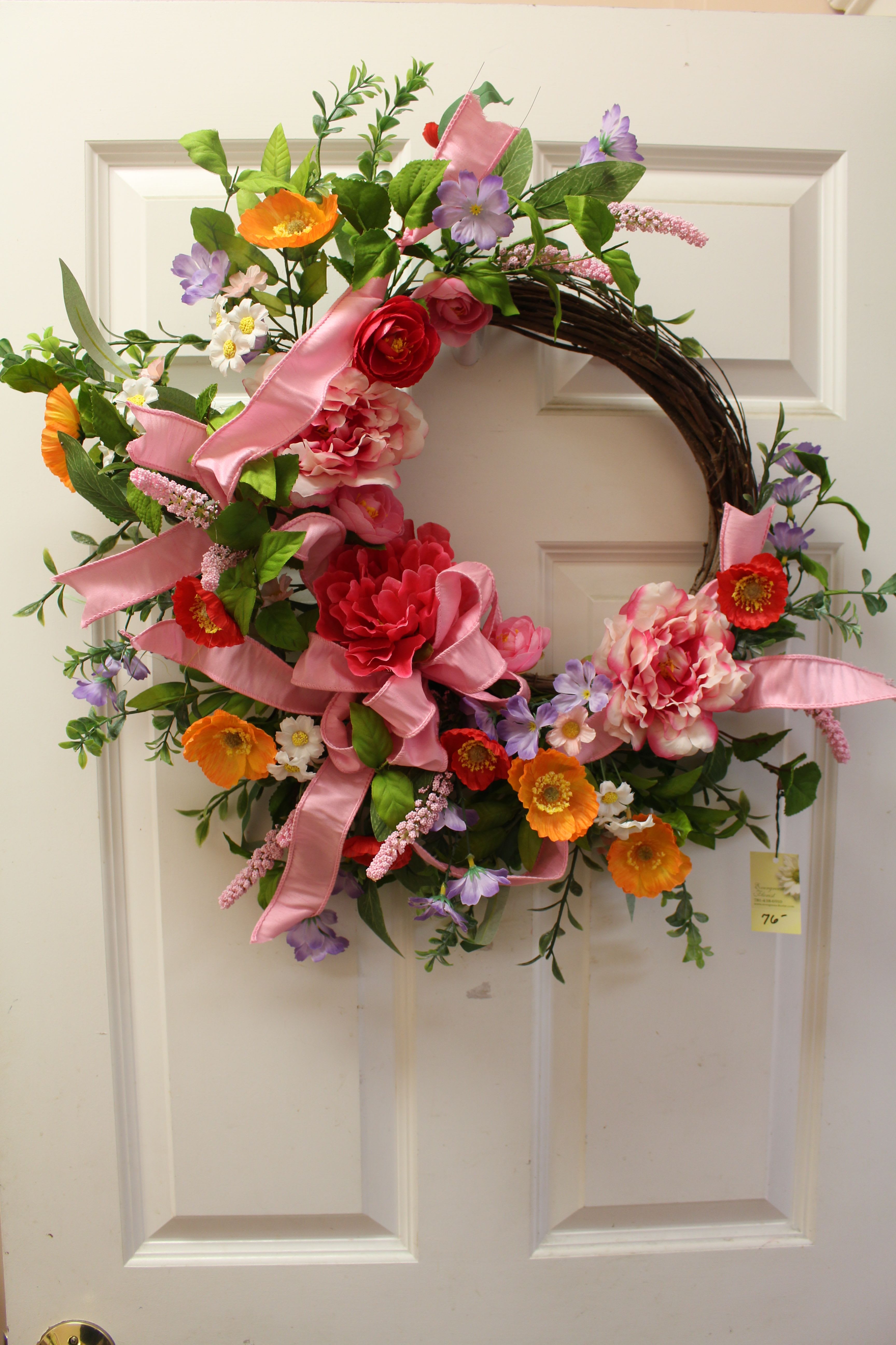bursting summer wreath - A grapevine wreath bursting with summer colors 