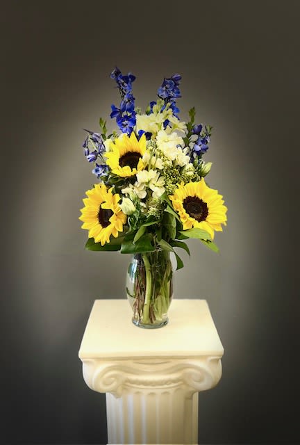 Sunny Skies - Sunflowers will brighter their day no matter the weather.
