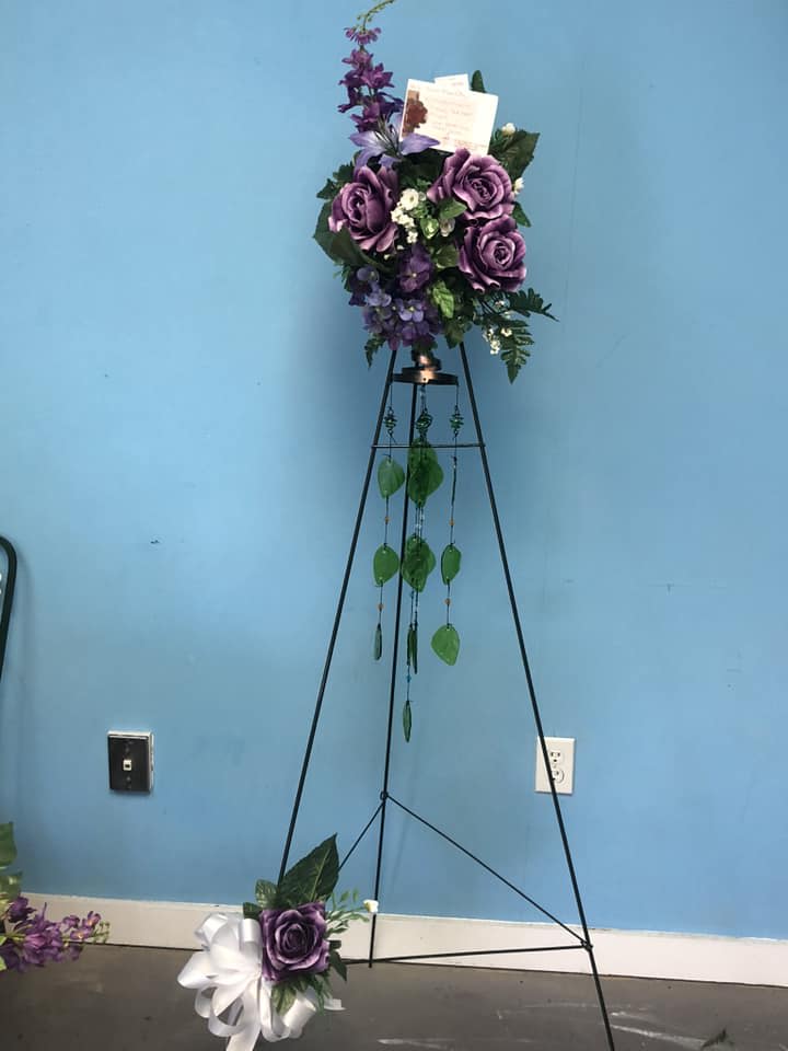 Keepsake WIndchimes with keepsake silk flower arrangement - This is a wonderful keepsake for a family going through grief. Send the family something they can keep. The flowers on here are silk, that way they get a silk arrangement they can take off and reuse as well.