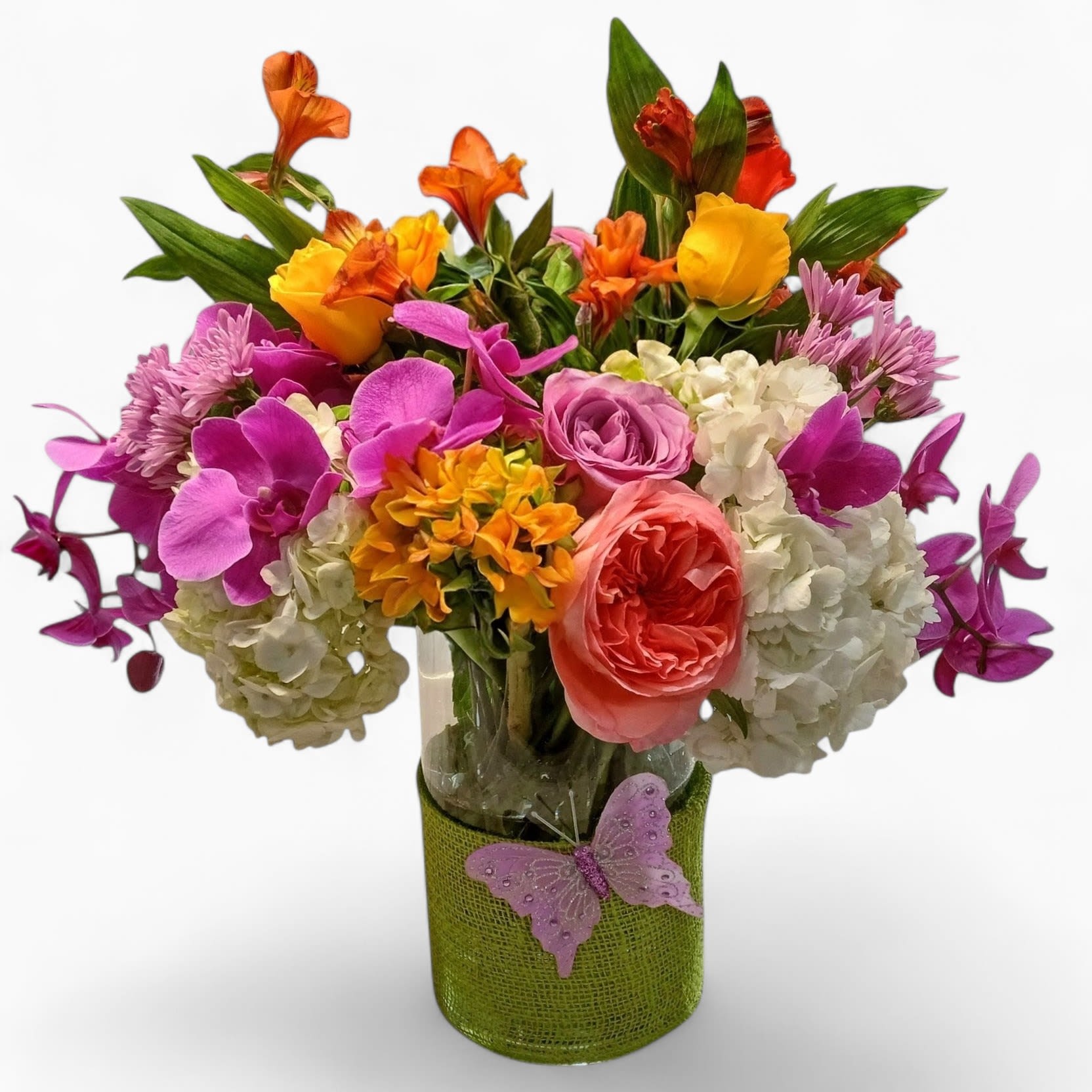 The Beautiful One Mixed Blooms - Send this beautiful mixed blossoms beauty today to show them how much you care with it's lovely colorful cheerful roses orchids sunflowers hydrangeas and more arranged in a tall modern glass cylinder vase wrapped in fresh citrus color jute ribbon. Perfect to send today for every occasion. Send happiness.