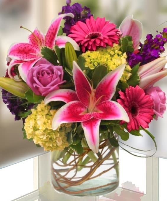 Soulard Tiger Lilies, Stock and Roses, Oh my! by Chino - This floral with say a million thanks and let that person know how much that they are apprecitated.   Lilies may be substitued for white lilies  16498