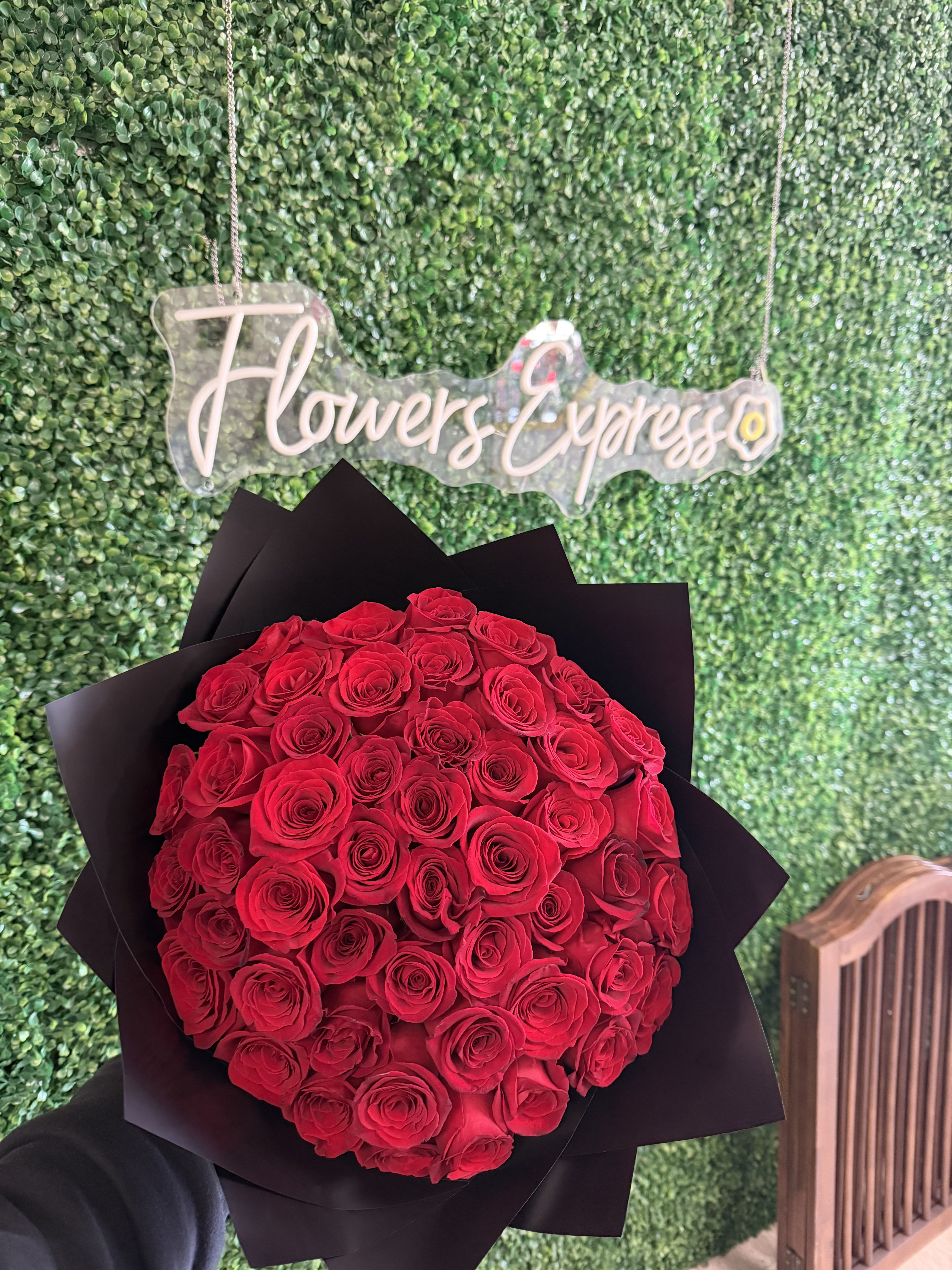 50 reasons for love bouquet  - 50 red rose bouquet wrapped in decorative paper tied with a red bow for any occasion specially perfect for Valentine’s Day 
