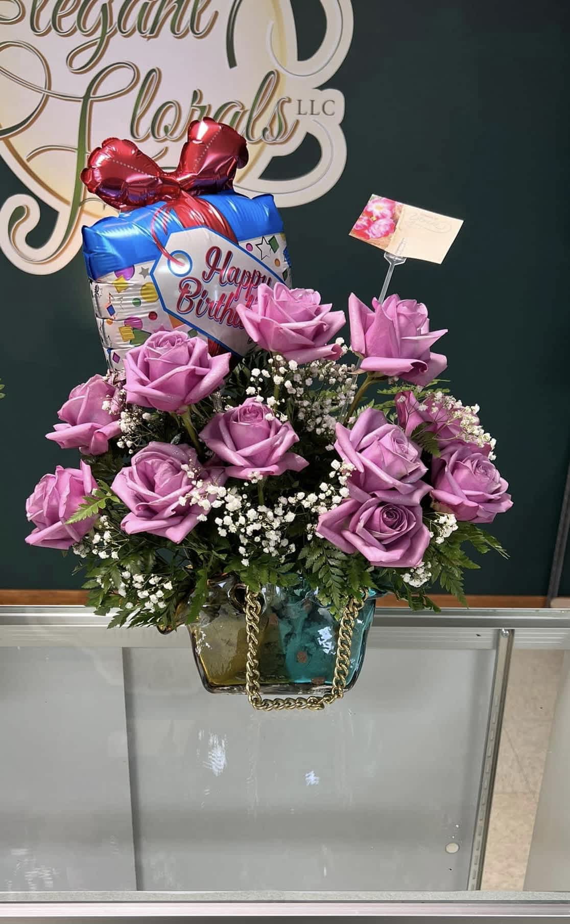 An Array of Roses - This design is absolutely stunning. Perfect for get well soon, just because, birthdays and so much more. 12 roses your choice of color.