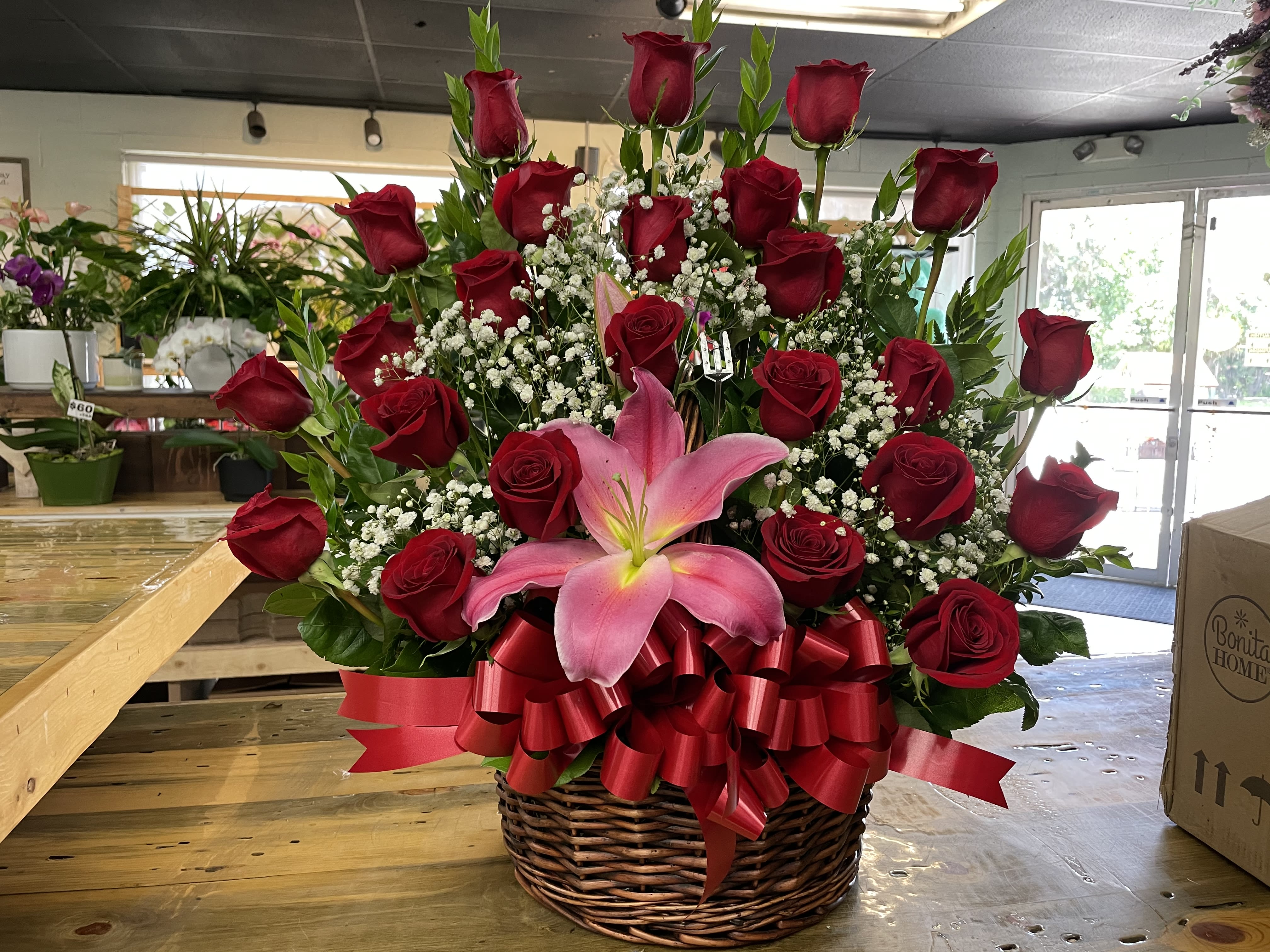2 Dozen Basket/Wooden Box - 2 Dozens of our Ecuadorian Roses. Large Basket arrangement that will be sure to wow. Depending upon availability, basket may be replaced by wooden box.  