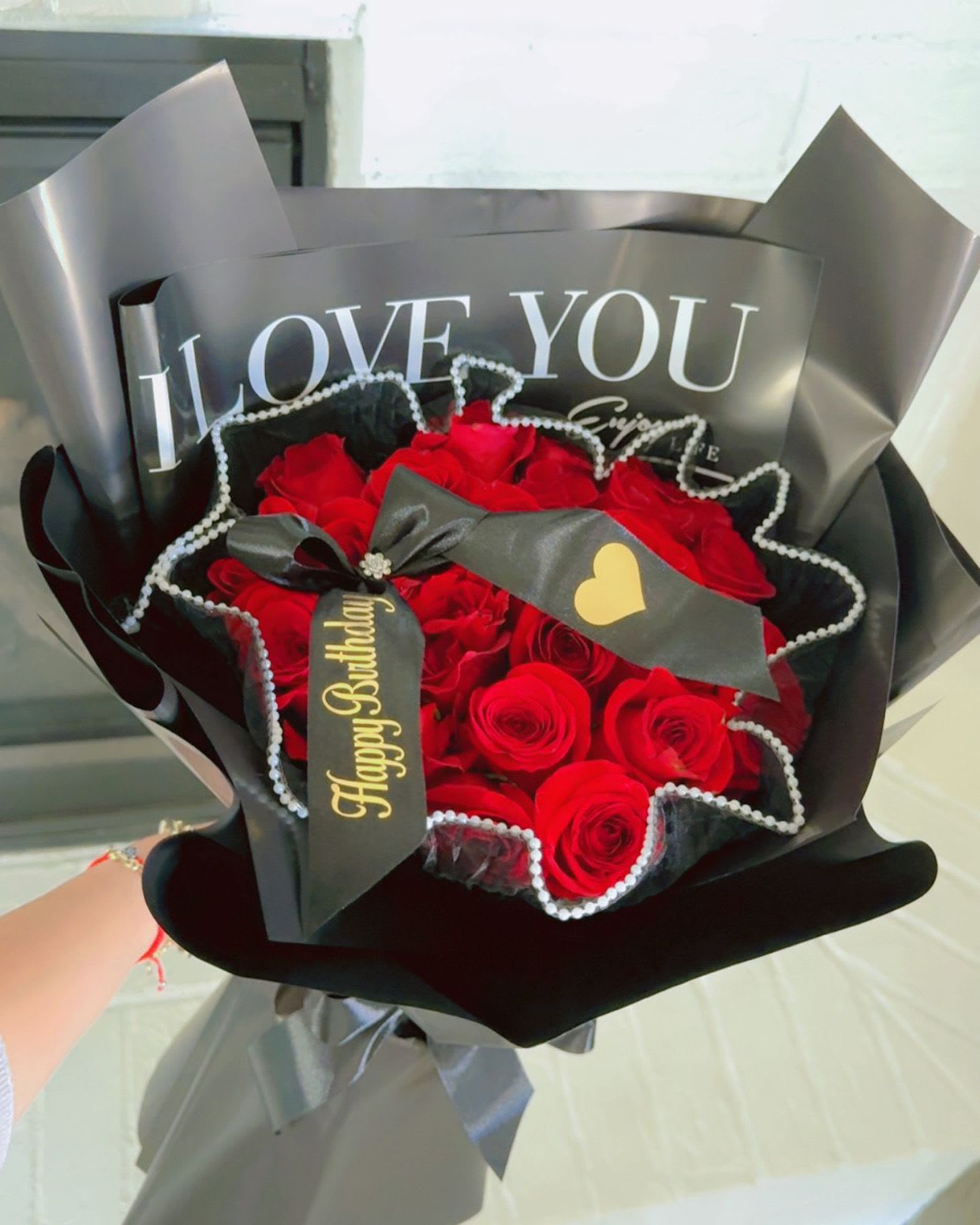 Essence of love - 24  roses that do not scream... whisper I love you.