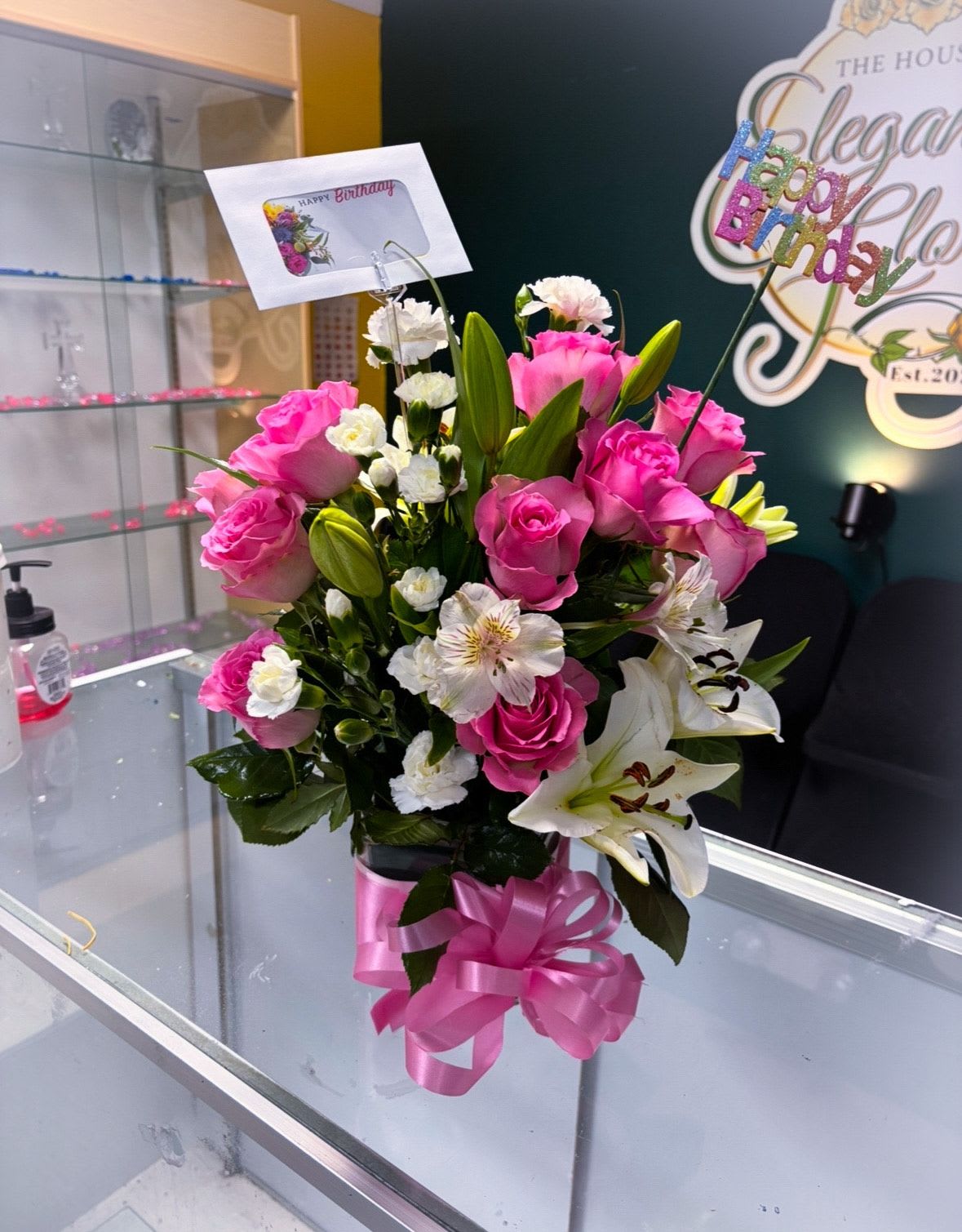 Timeless Blush Vase Arrangement -  Fresh, premium pink roses and elegant lilies, carefully arranged to highlight their beauty and fragrance.