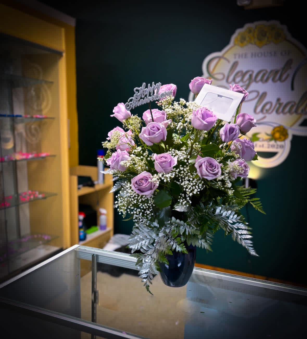 Moonlight Rose Vase Arrangement  - This awesome vase arrangement will most definitely put a smile on faces. These moonlight naturally colored roses is a hit wherever you take them.