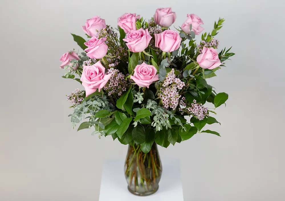 Dozen Pink Roses - A beautiful selection of pink roses arranged in a vase!