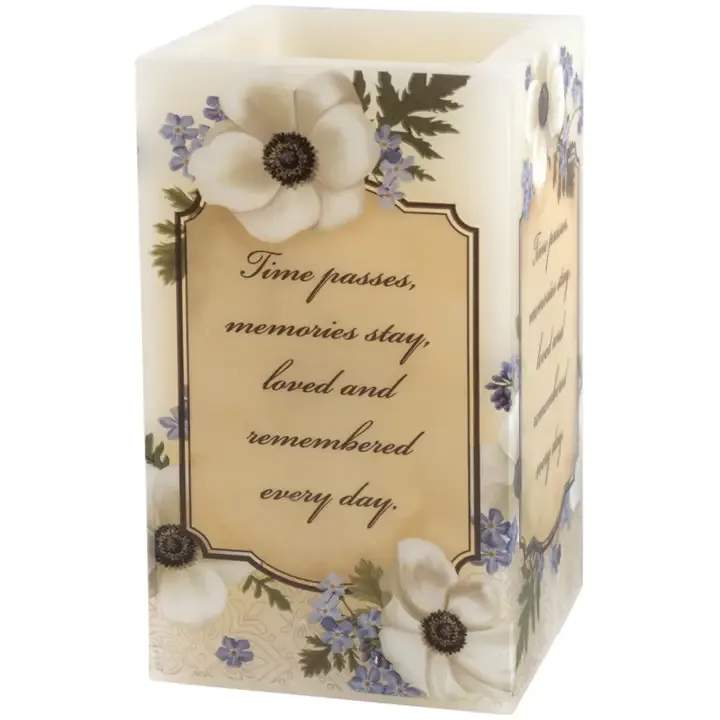 "Time Passes" Square Candle - The square candles are made with real wax with a vanilla scent. Each candle features a flickering LED flame that has a timer that runs 6hrs ON and 18hrs OFF. 2 AA batteries are required but are NOT included. Candle reads: "Time passes, memories stay, loved and remembered every day"