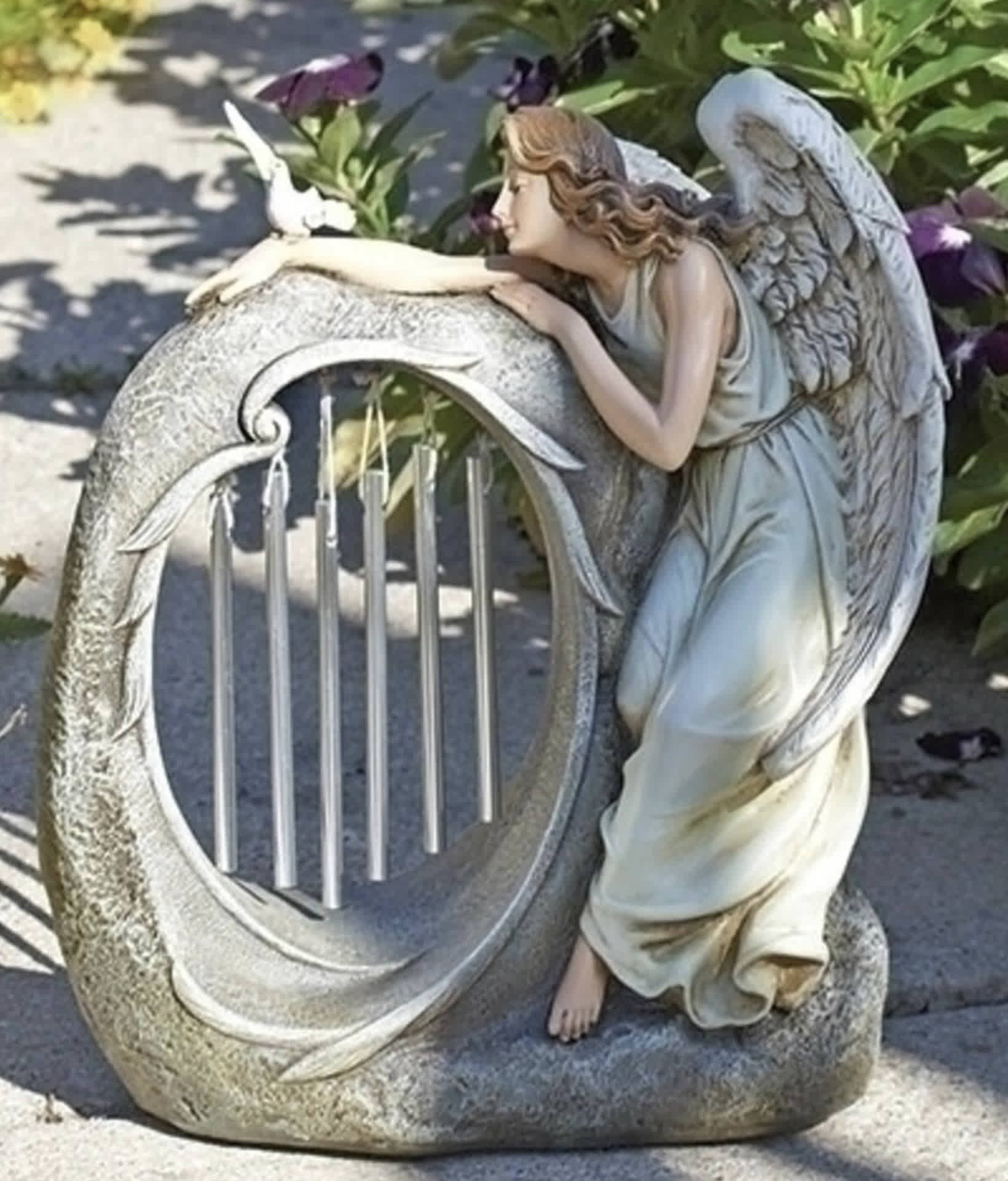 angels- Joseph's Studio Angel with Dove Wind Chime Garden Statue 10.75" - This beautiful angel with wind chime statue in your garden, yard, or home entrance. Statue displays an angel leaning over a rock accented with wind chimes, a dove is perched on the angel's wrist meticulously crafted, with natural colors and great attention to detail. 