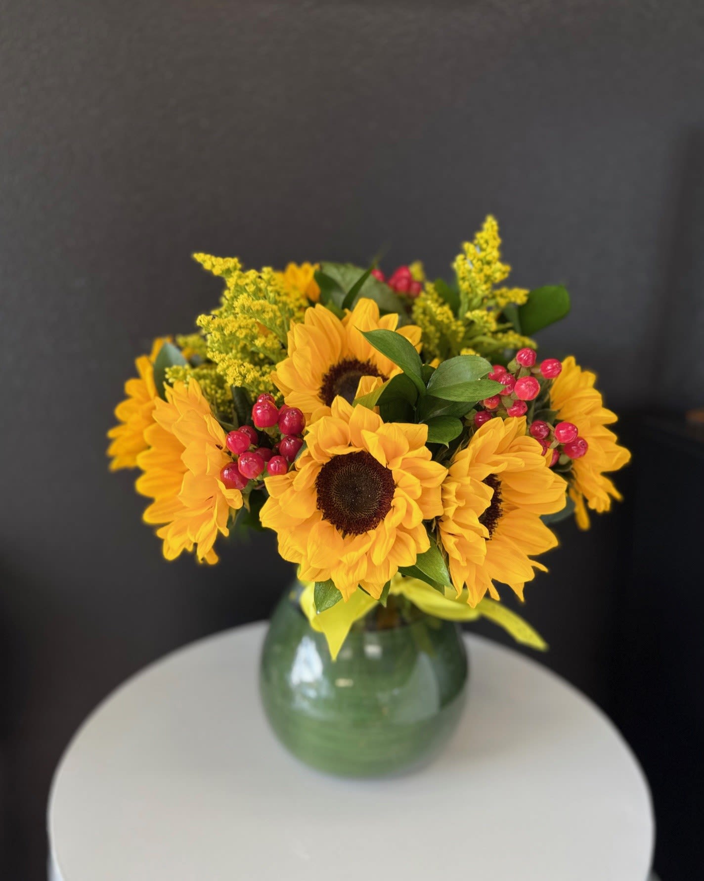 Sunny Sunflowers  - The sun is pretty great, but sunflowers are the greatest. Let’s prove it. The sun keeps us warm, we’ll admit it, but sunflowers never make us sweat. The sun gives us the daytime, which we appreciate, but sunflowers don’t go away for 12 hours per day day. Sunflowers, unlike the sun, know that would be rude. Finally, the sun gives us a nice tan once in awhile, but sunflowers have never given anyone a sunburn. This autumn, let sunflowers enhance your life, or the life of a loved one, with this Sunny Sunflower arrangement! You will not regret it.