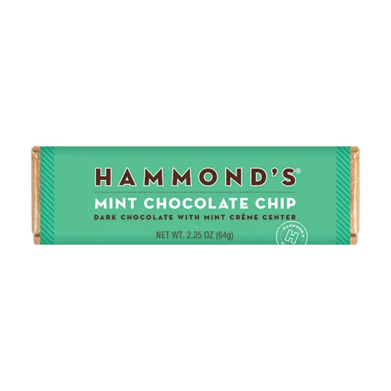 Hammond's Mint Chocolate Chip Chocolate Bar - Indulge in the refreshing taste of Hammond's Mint Chocolate Chip bar! These delectable treats feature a creamy and minty center, wrapped in a layer of rich dark chocolate. With a unique flavor combination that's both sweet and cool, these bars make the perfect snack anytime, anywhere.  OU-D Kosher 2.25 oz. Chocolate Bar  Please note: Made with gourmet premium ingredients and fun flavors! Manufactured in a facility that processes egg, milk, mustard, peanuts, sesame, soy, sulfites, tree nuts, and wheat.    