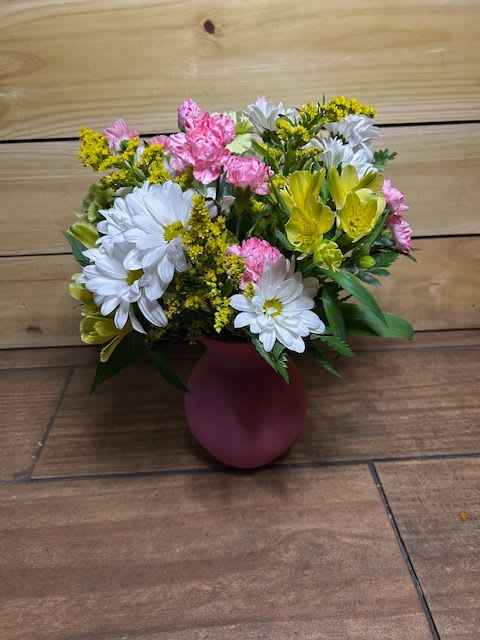 Spring Blooms - A mix of spring blooms in a spring colored vase