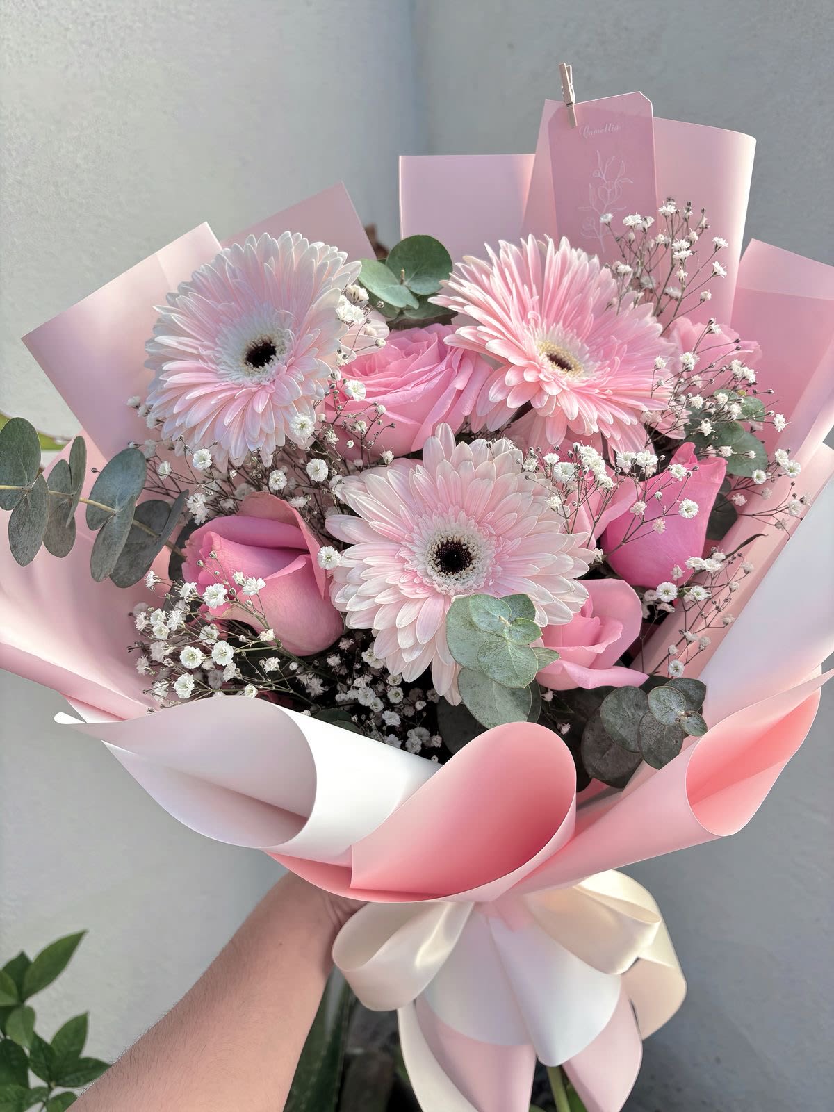 Petite Rosé Bouquet - A small, elegant pink bouquet featuring fresh roses, delicate gerberas, and fragrant eucalyptus. Perfect for gifting on birthdays, anniversaries, Valentine’s Day, or as a thoughtful gesture for someone special. 