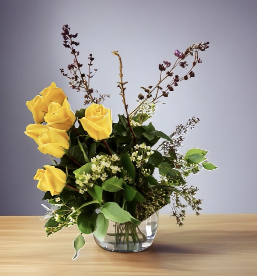 Mellow Roses.   BN™ - Yellow Roses are a great option to send as an I love You for being you.  Send a splash of brightness and admiration to your friend or family member.  Brighten up their space and celebrate them! Yellow roses are a good gift for graduations, birthdays, or celebrating an accomplishment like a new job. PJf reminds you that the Fellows to Mellow! Male appropriate  NOTE: Our flowers and greens are a gift from nature. Its shade and depth might vary, design, aesthetic and value remains the same. In support of our efforts to aide in the preservation of our planet, PJf uses Fair Trade flowers, Plants, Upcycled and Recycled containers. Vase may vary.