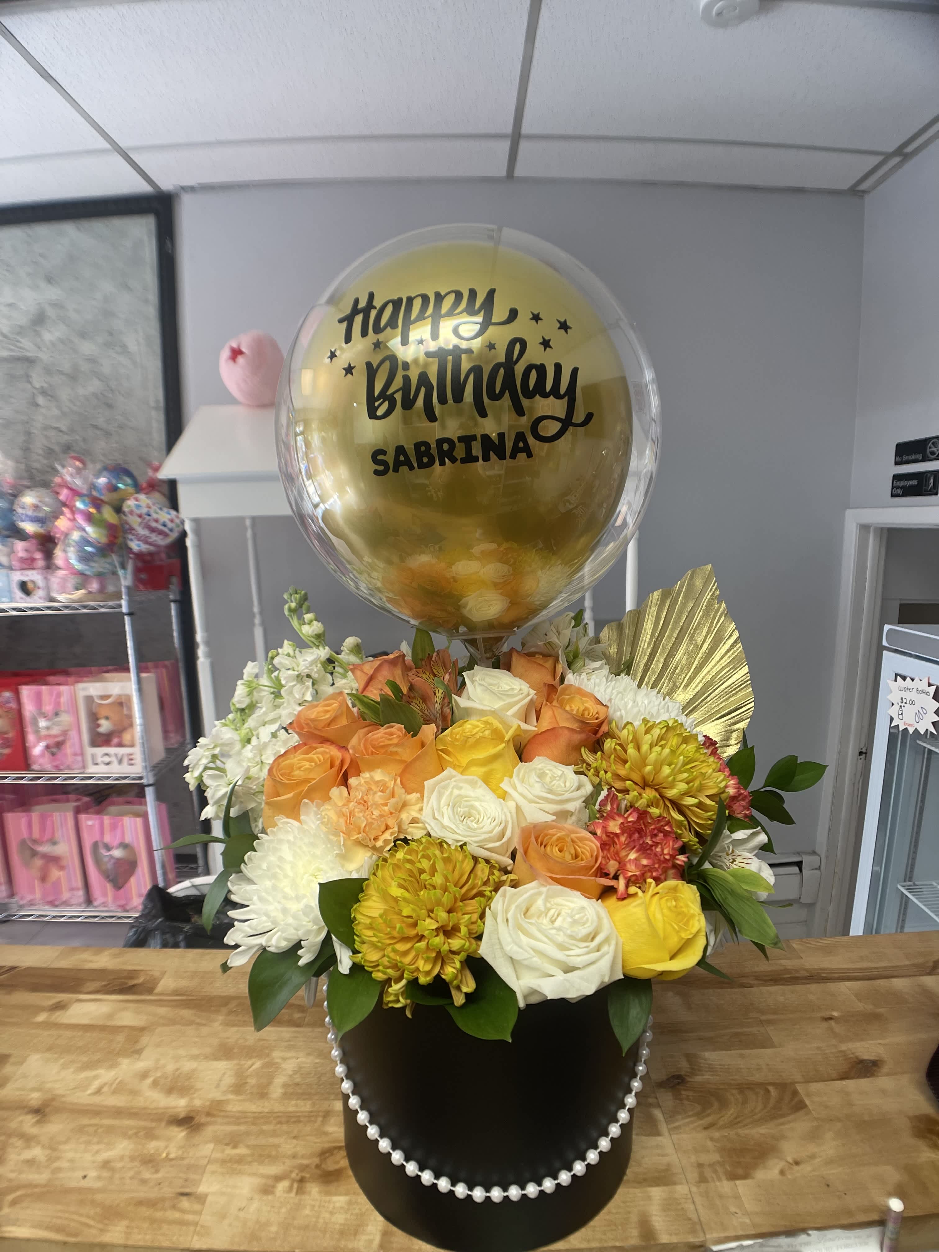Mixed yellows  - yellow flowers in a hat box 