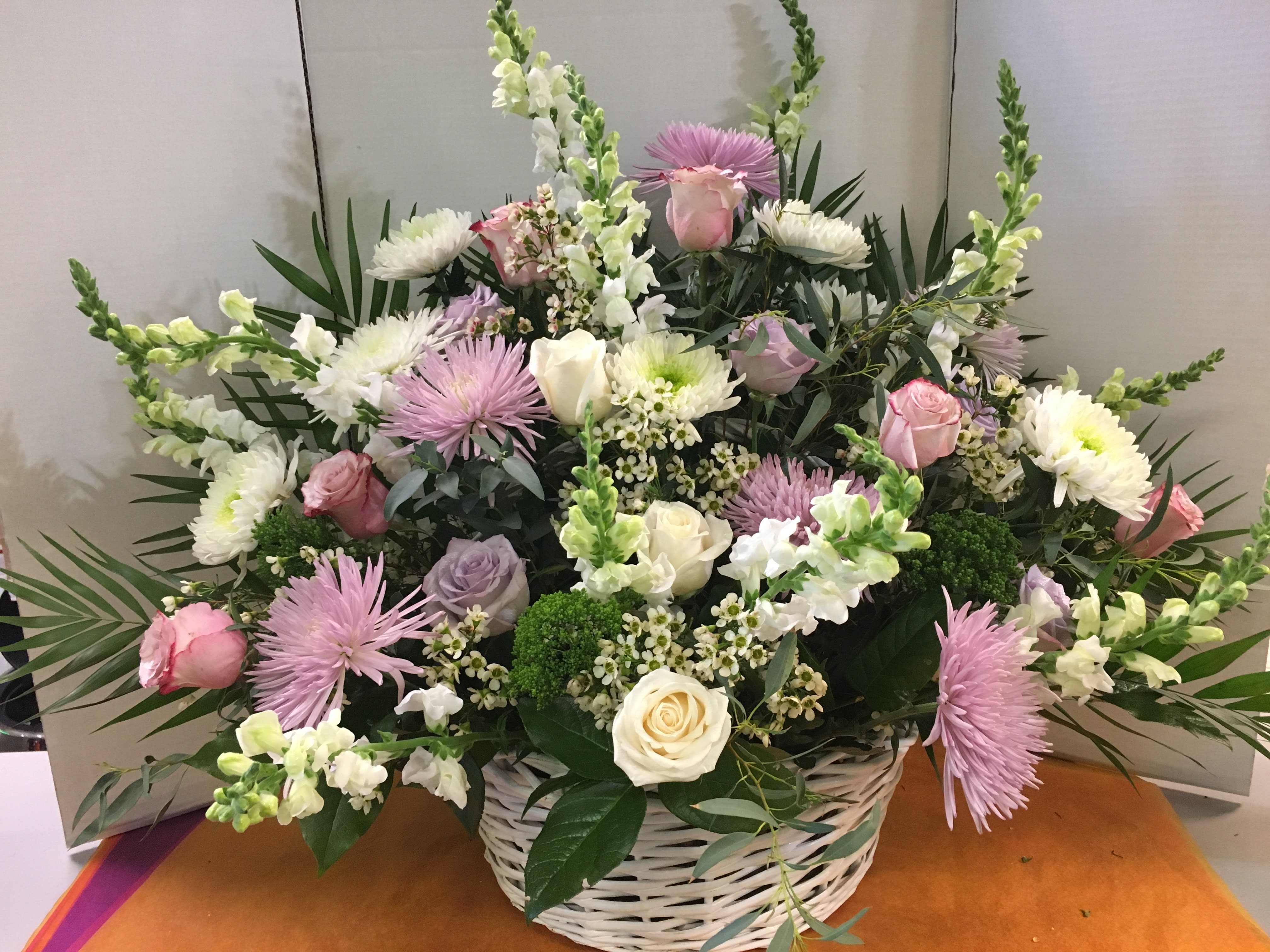   Lavender Basket  - Spider Mums, Roses,  Cremons,  SnapDragons, Wax Flower,  Fancy Greens