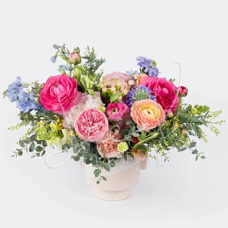 Pretty in Pastel - Oh so pretty! Dreamy pastel premium seasonal florals arranged in modern footed speckle vase. Perfect for someone who is both stylish, modern and fun! Milton Vase 5.5" x4.5"