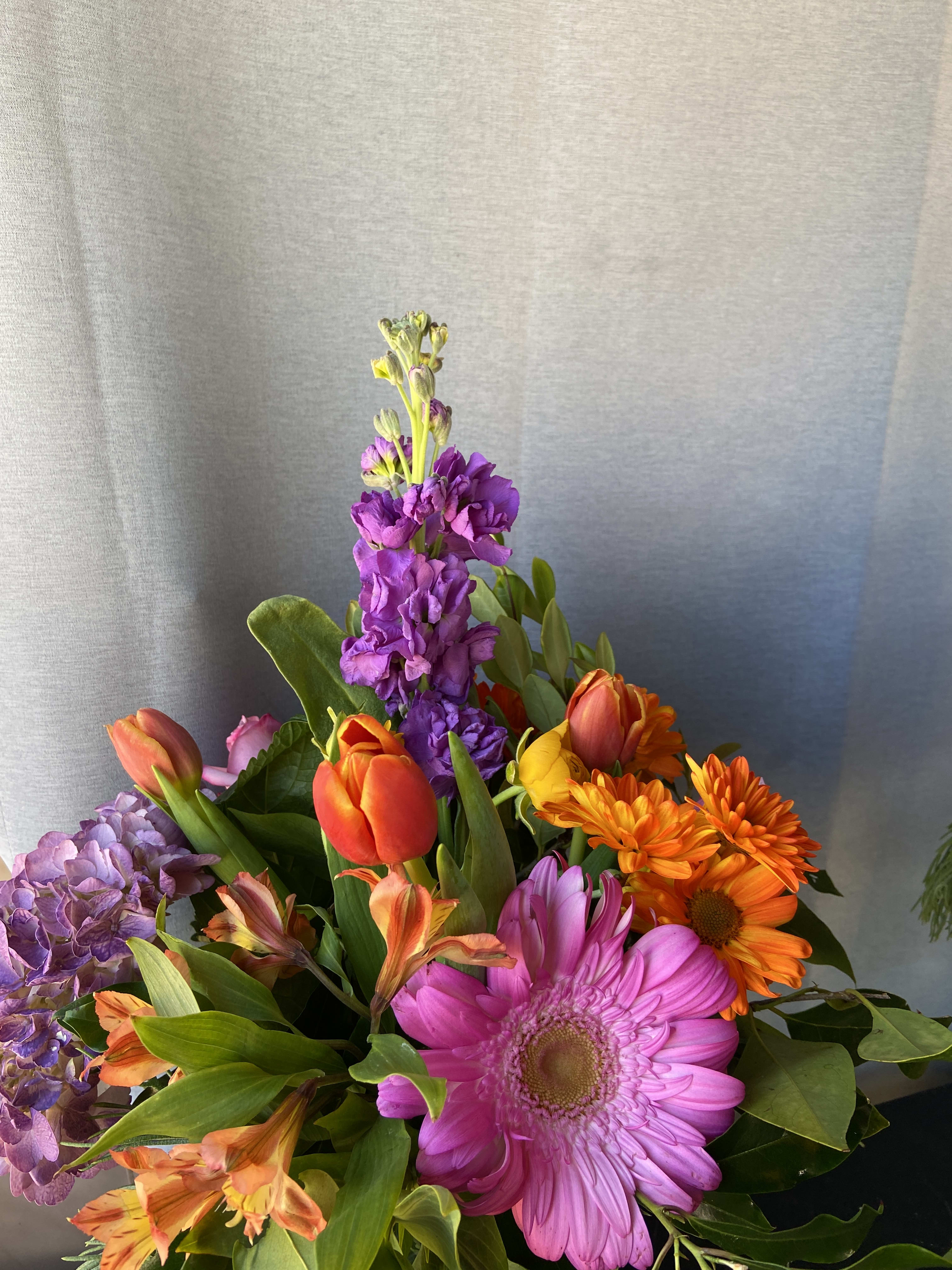 Best Day BQ. - A combinations of bright and colorful flower, in a 10" vase.