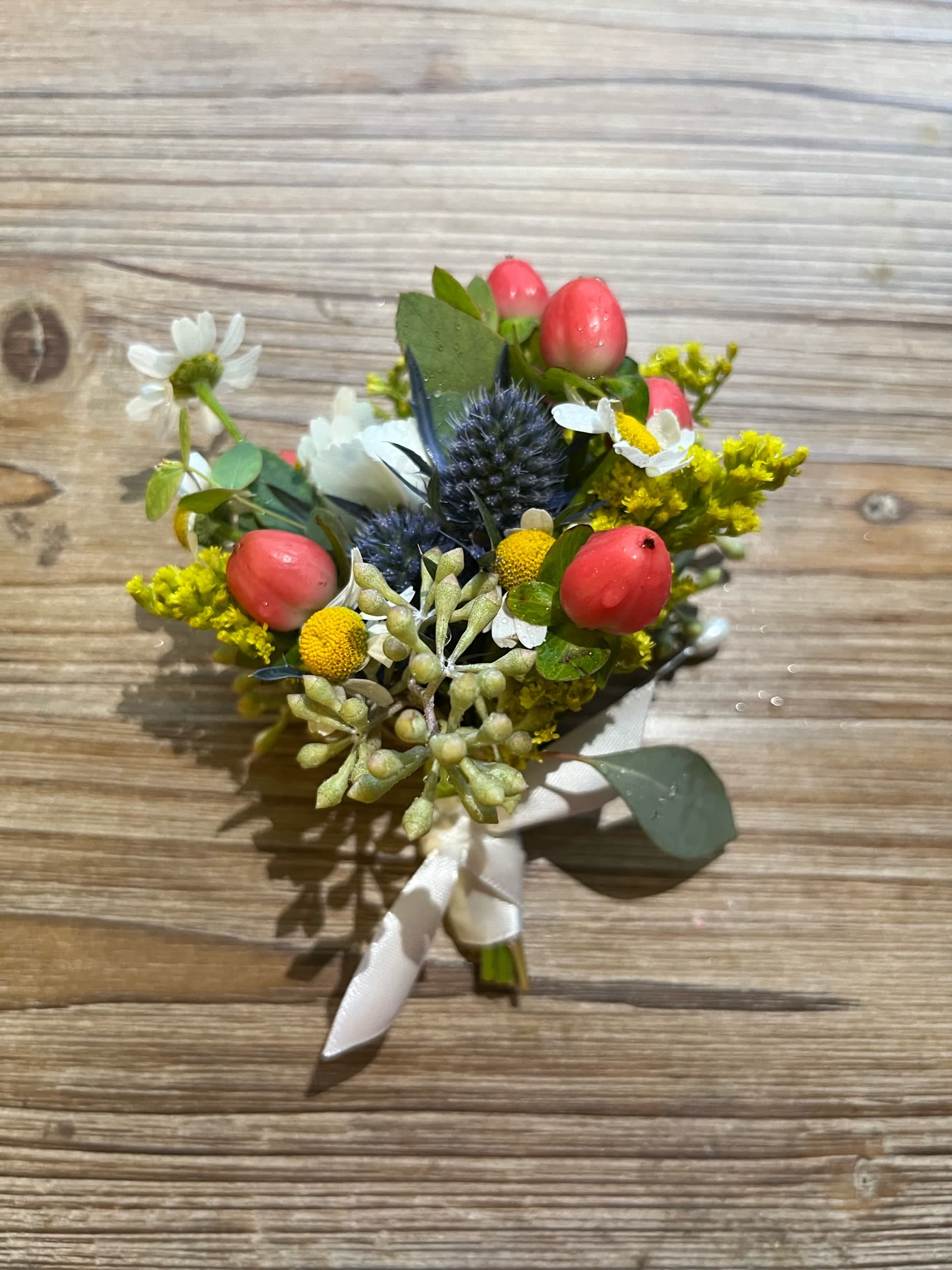 Boutonniere #3 Wildflower Mixture - Wildflower mixture with seasonal flowers. Please specify ribbon color.