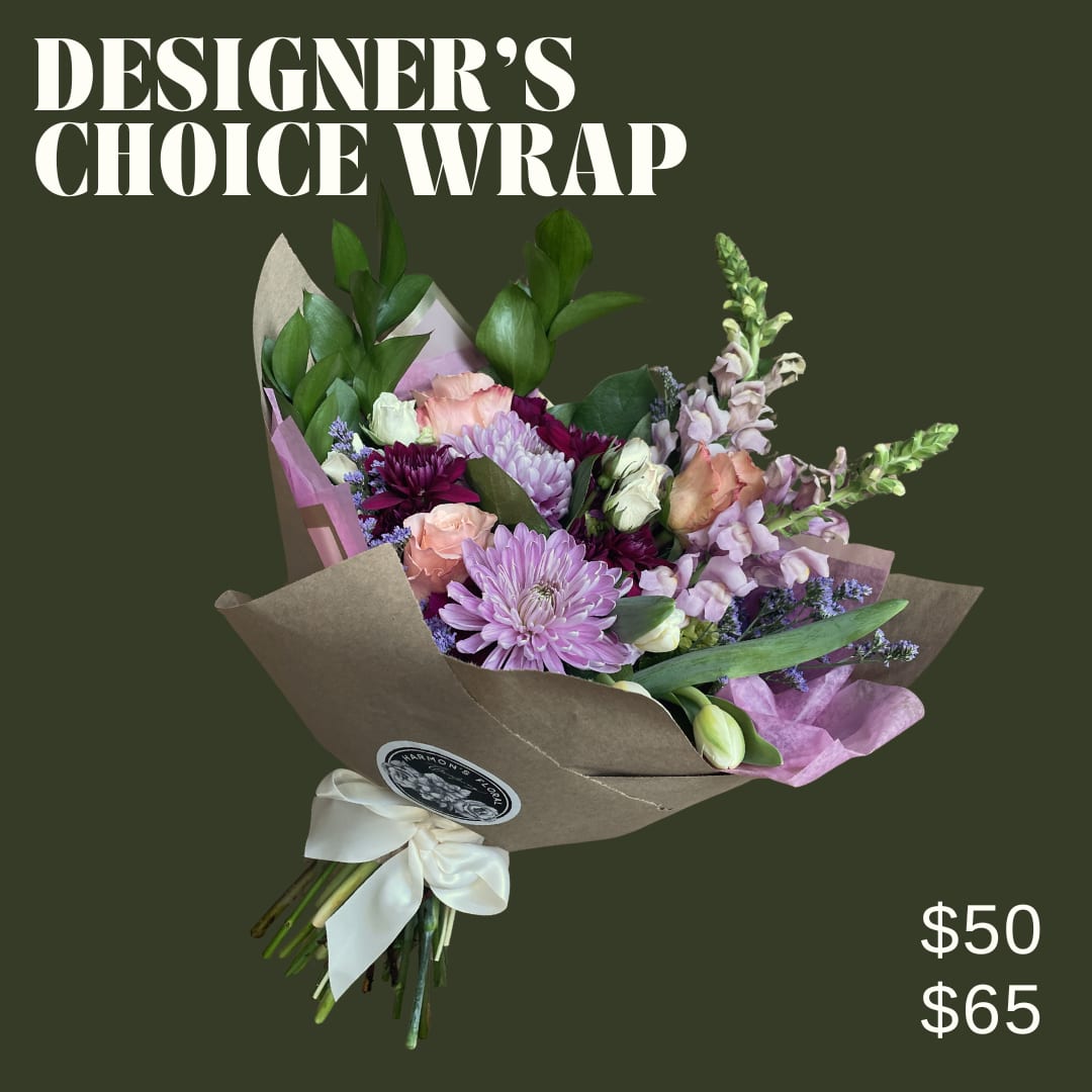 BOUQUET WRAPPED - An assortment of mixed flowers wrapped with paper and tied with a ribbon. Flower types and colors will vary by availability and freshness.  LOCAL DELIVERIES ONLY!