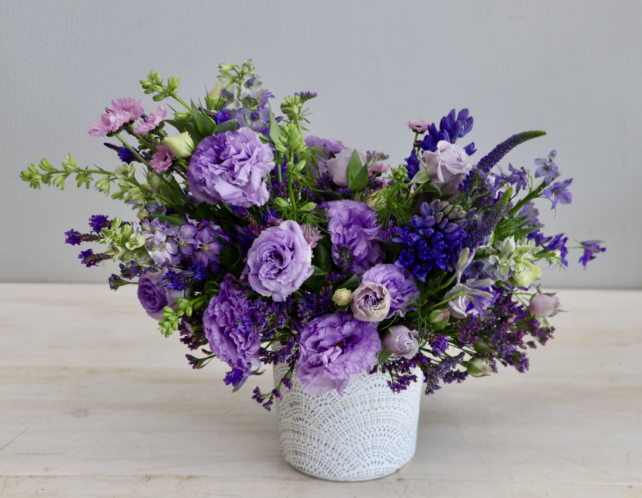 Purple Hues - My Glendale Florist  - Lisianthus is a delicate, pastel-colored flower known for its romantic appearance and long-lasting bloom as a cut flower.