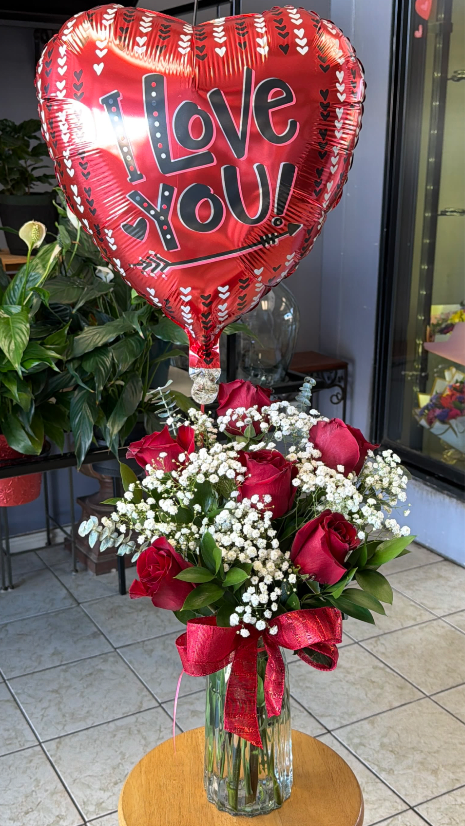 6 Red Roses with Mylar Balloon - Six red roses with an “I Love You” balloon—classic, passionate, and full of heart. 