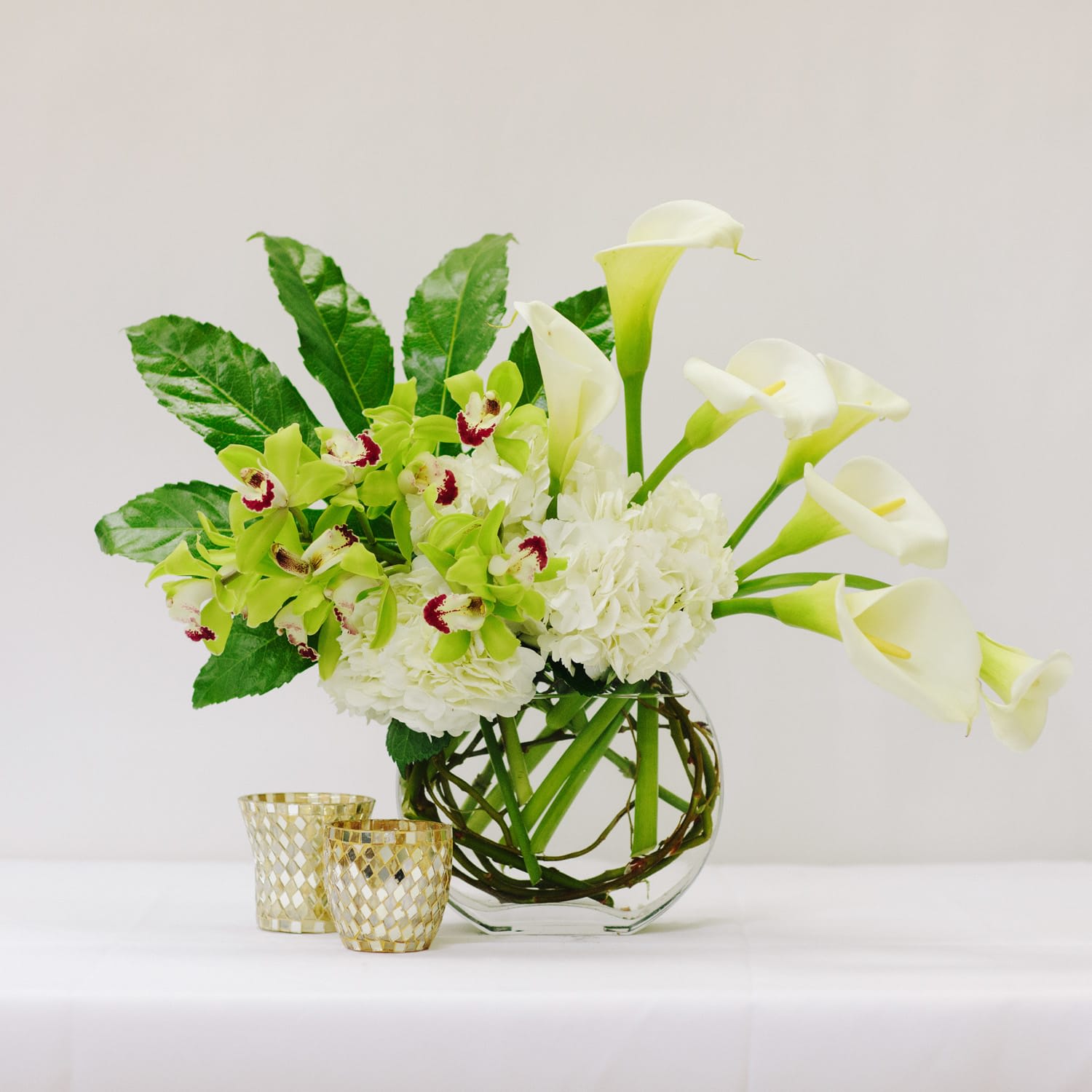EMELLY IN PARIS - in a glass vase combination of white and green flowers
