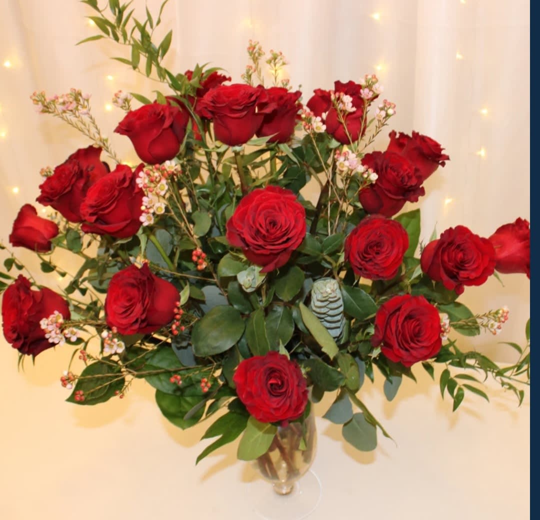 24 long stem Red Rose Arrangement - This rose arrangement will steal the show and make a huge impression that will last forever
