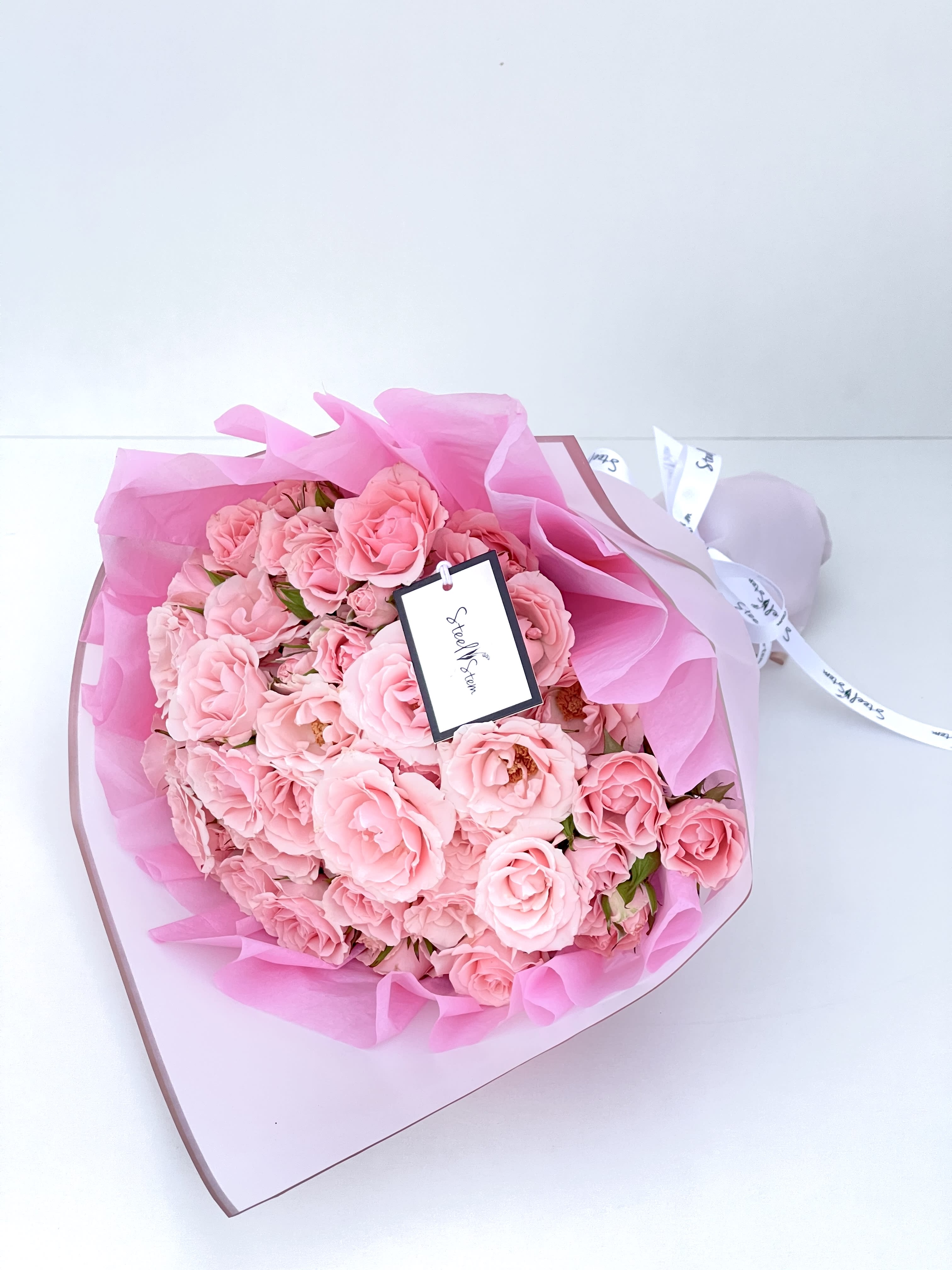 Pink Wrap Bouquet  - Pink mini spray roses Beautiful wrap &amp; Steel Stem ribbon. 