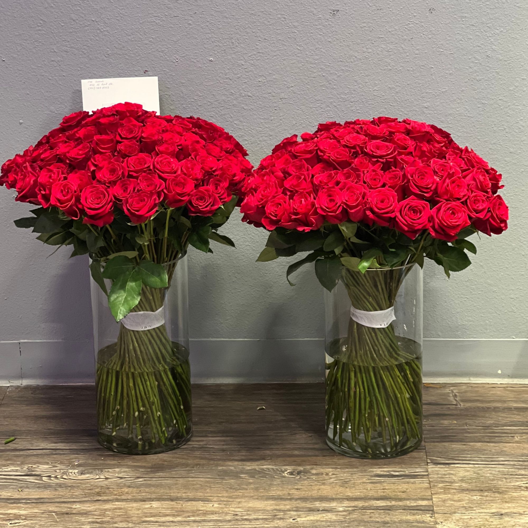 200 Red Roses  - 200 Red Roses in vases (included)
