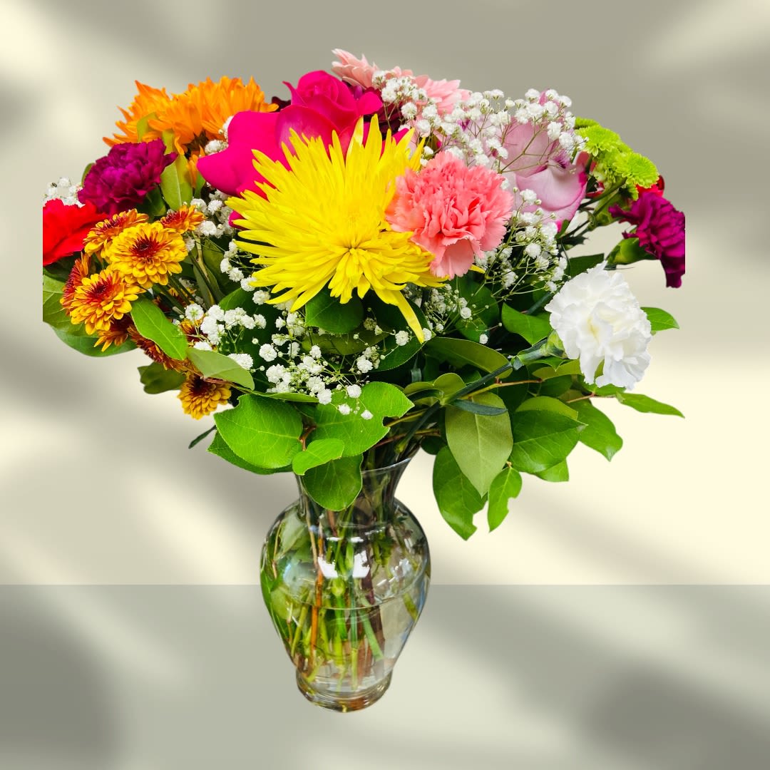 Mix flowers in a Clear vase  - Mix flowers 