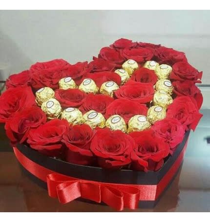 red roses and ferrero - red roses