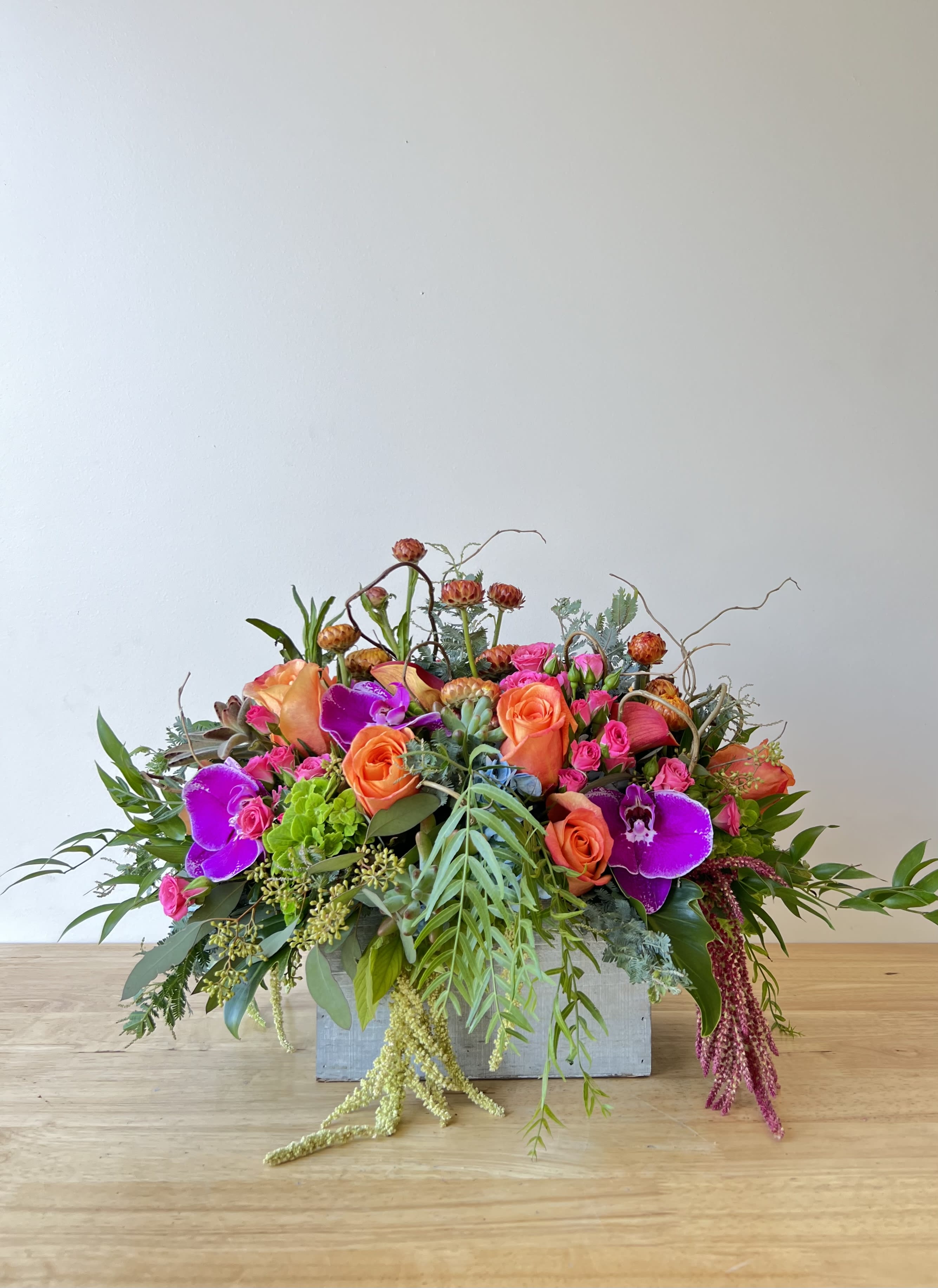 Tutti-frutti Box - Beautiful mix of spring florals, roses, orchids, mini calla lilies, hydrangea, and more.