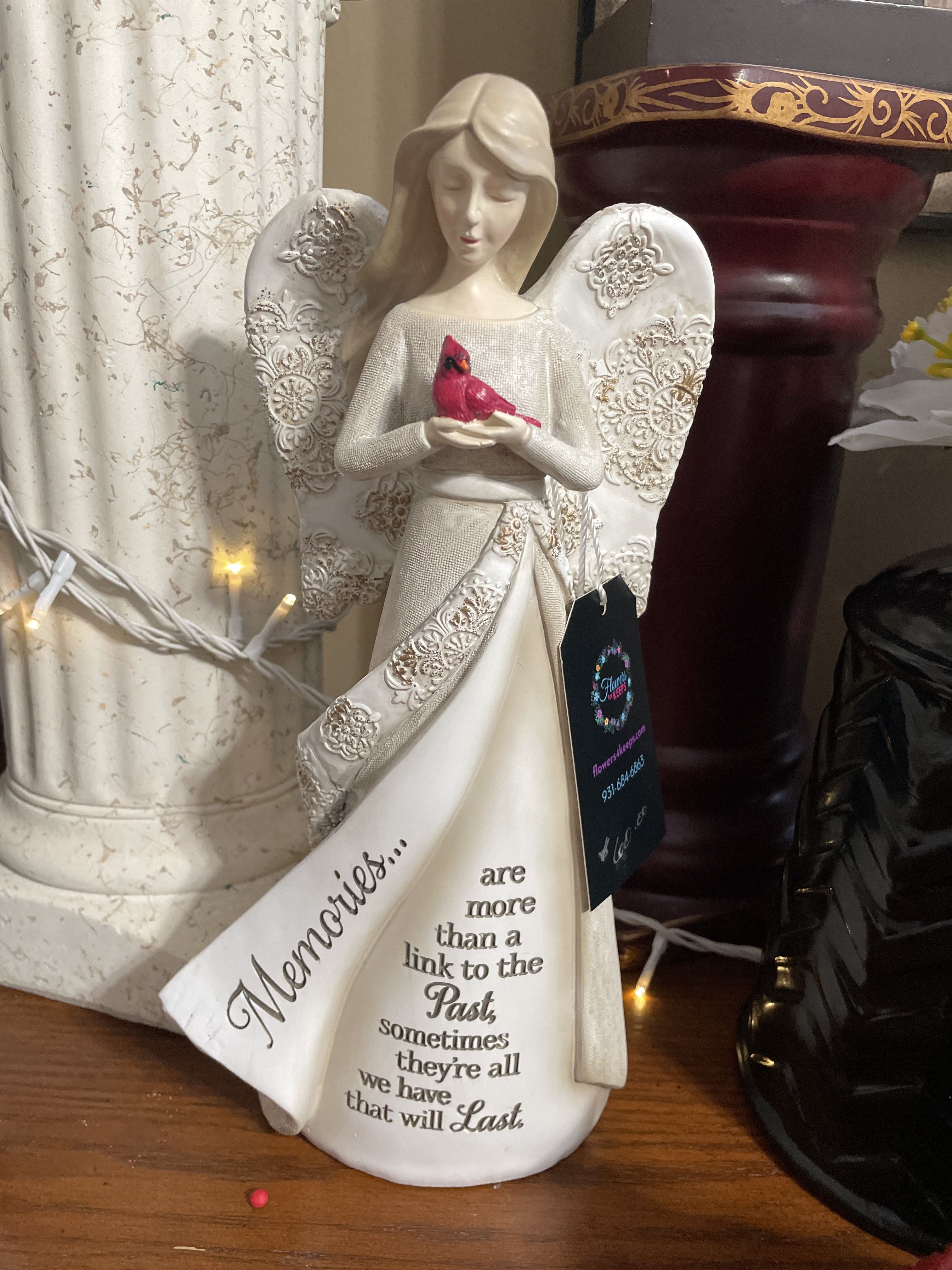 Memories Angel with Cardinal -  The perfect sentiment to send in memory of a loved one. Dressed up with ribbons, for the service, makes it extra special.    Please specify if you would like someone special to take the angel home with them, after the service.  