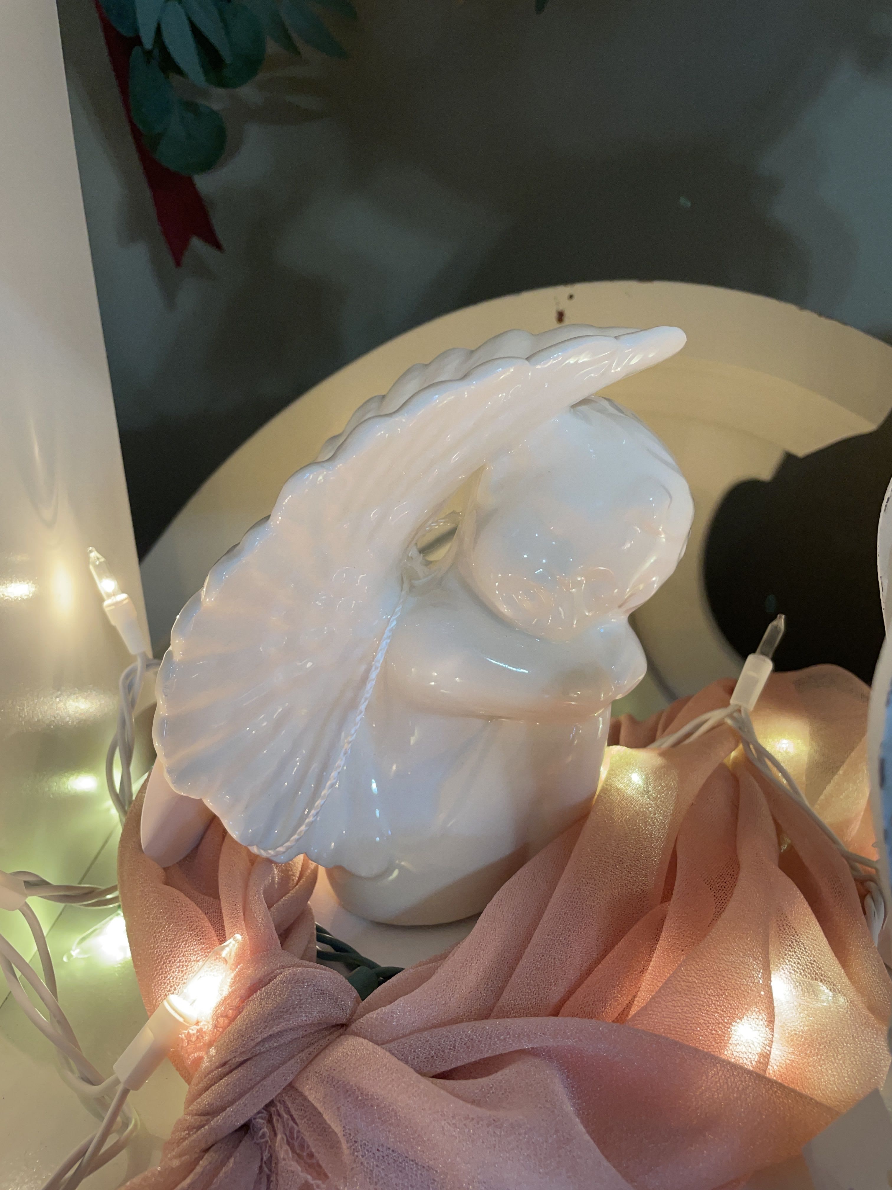 Praying Wings Angel Girl - White resin wood carved angel figurine. Wrapped for home. Bows for services. Approximately Dimensions: 6" W x 5.75" L  